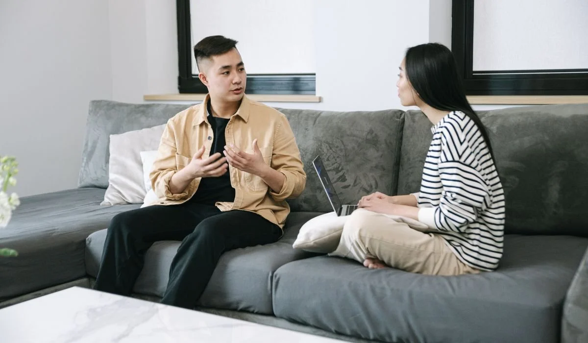 Couple having a thoughtful discussion about finances and future planning