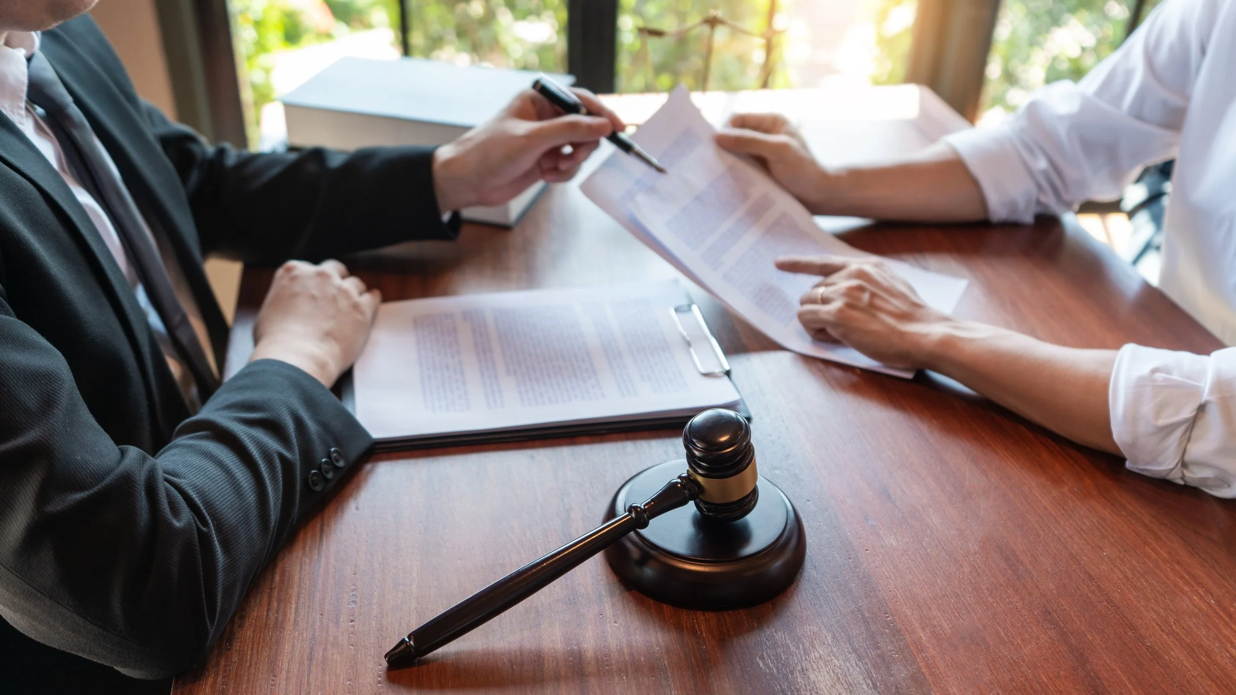 Attorney meeting with a client to discuss eligibility for Pennsylvania's ARD program
