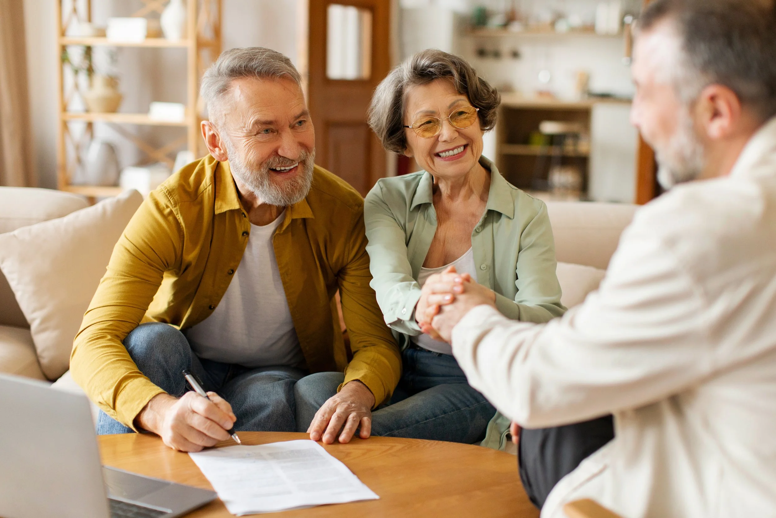 Estate planning attorney meeting with a client to review will and probate documents