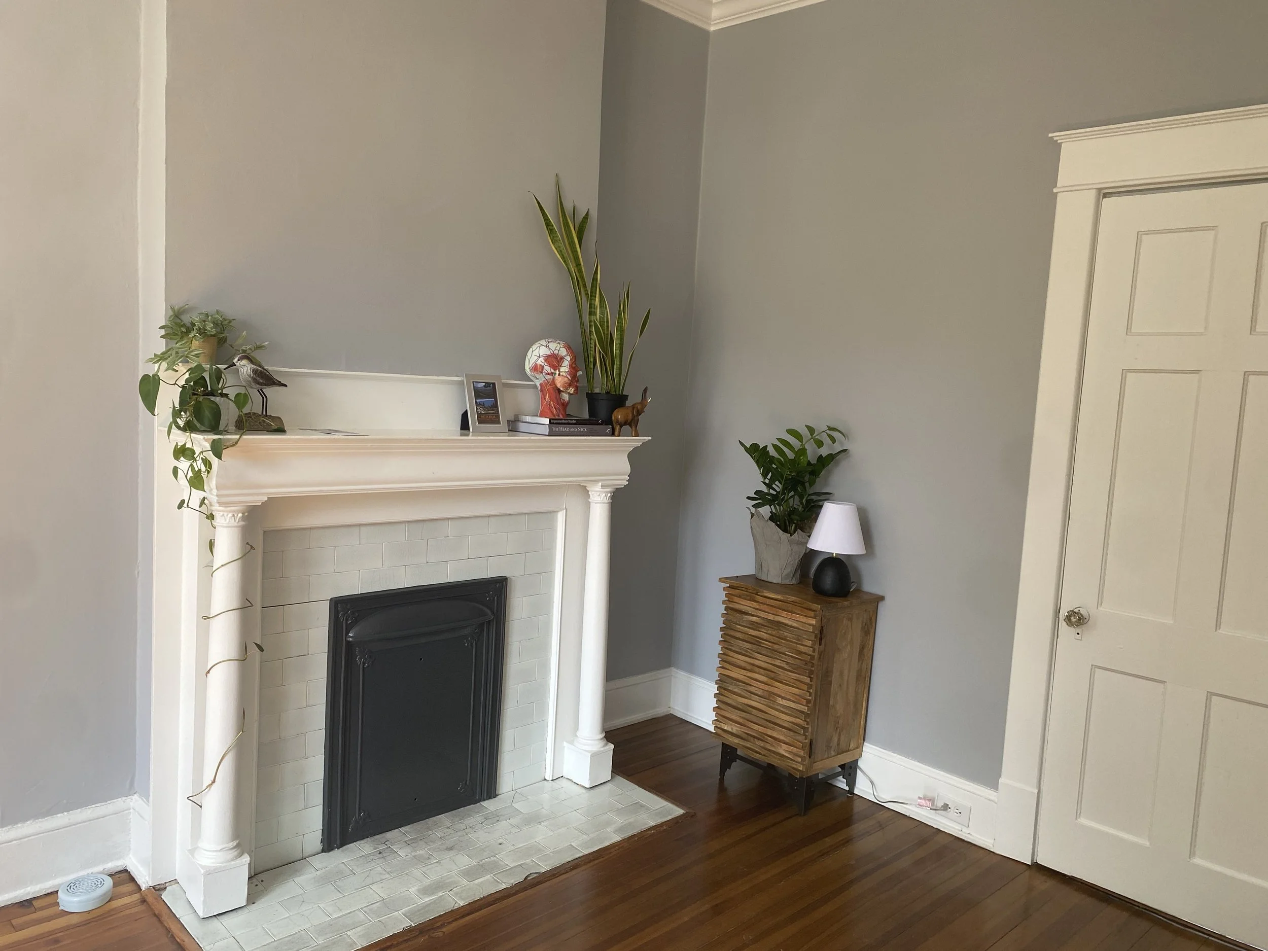 Victorian tiled fireplace in our new office