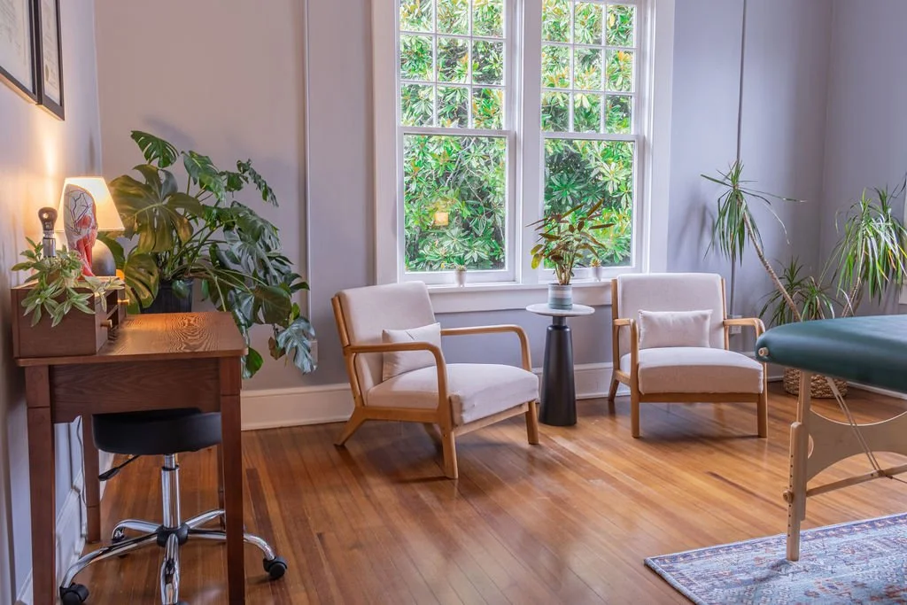 Migraine specialist office with large, 1920s windows and desk