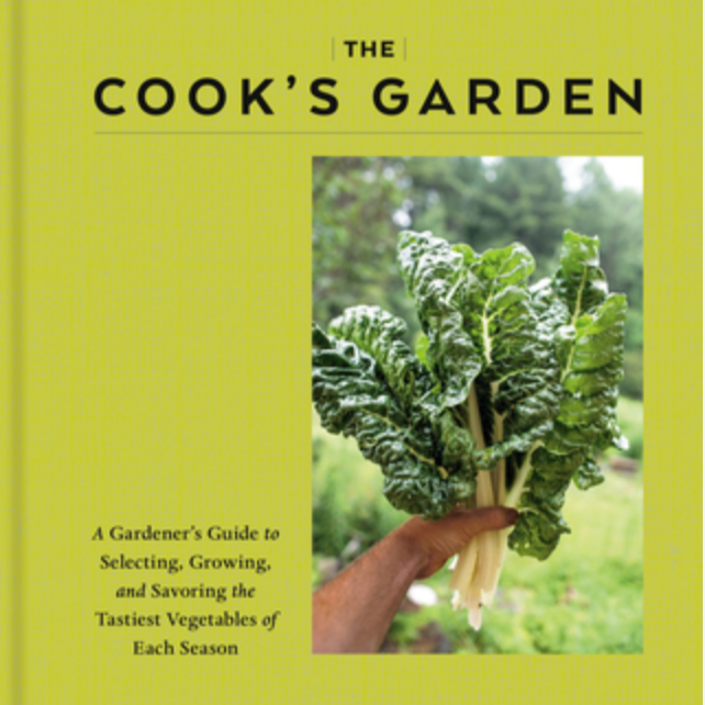 A green cover of a Cookbook for Gardeners, showing someone's hand holding up a bundle of chard.
