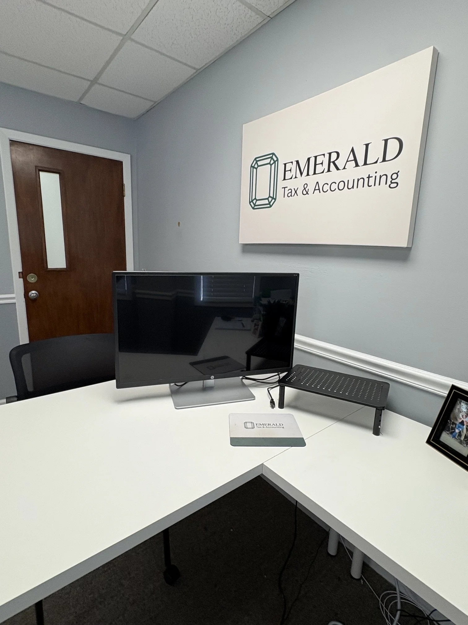 Business financial reports and workspace representing financial clarity for growing Jacksonville businesses
