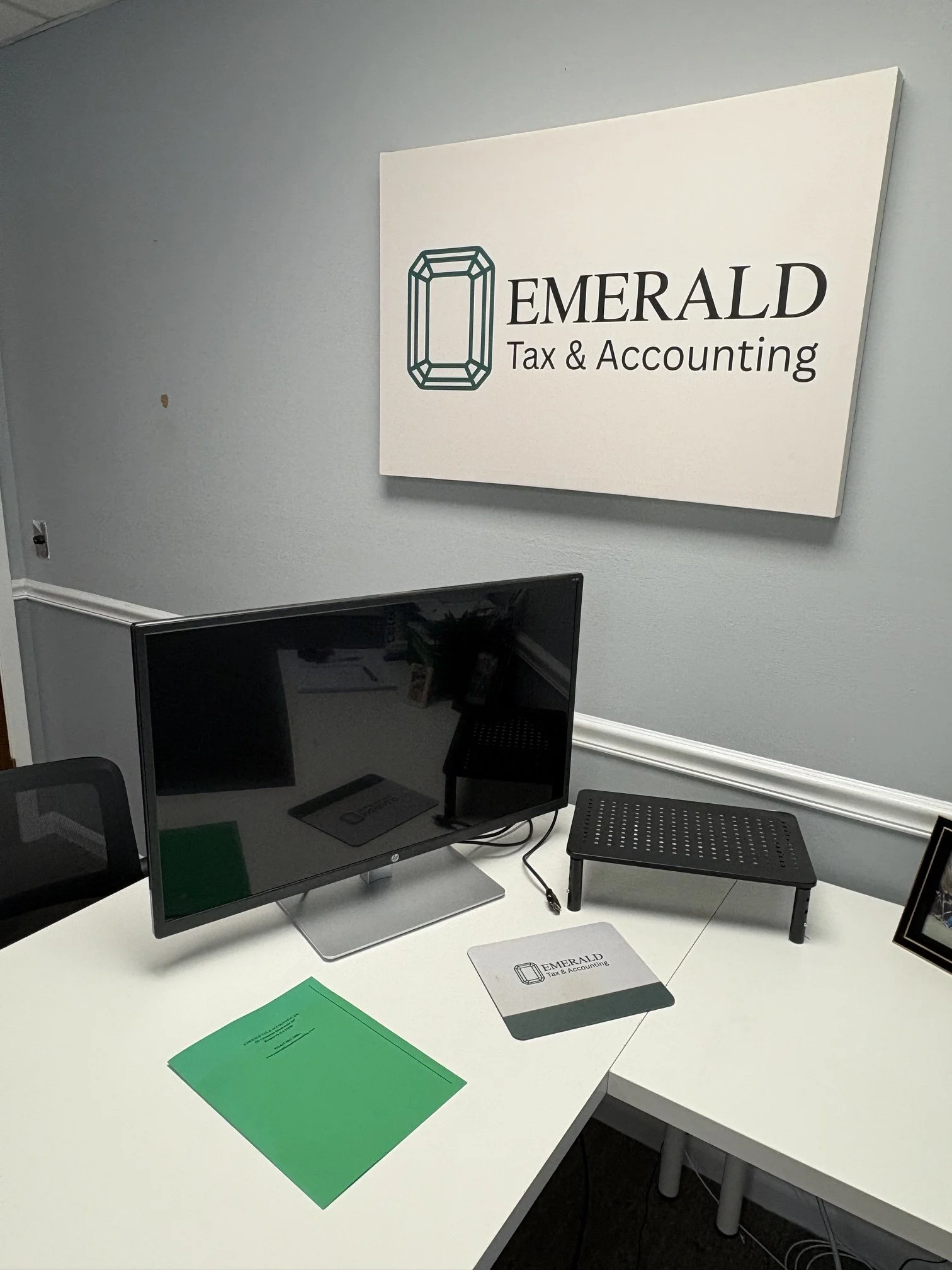 Small business financial records being reviewed for bookkeeping and financial planning