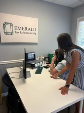 The Emerald Tax & Accounting team providing bookkeeping, tax preparation, and business advisory services in Brunswick, Georgia.