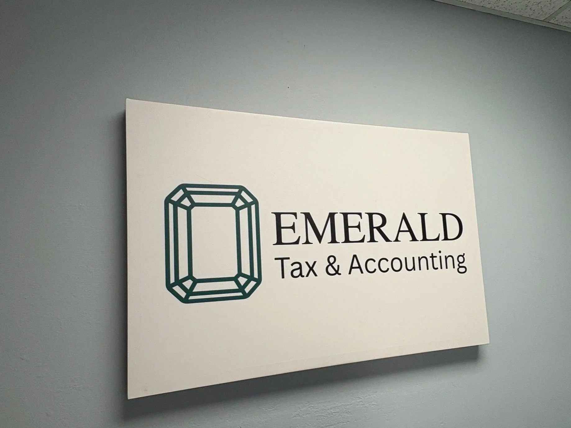 Emerald Tax & Accounting branded office workspace for professional tax preparation services