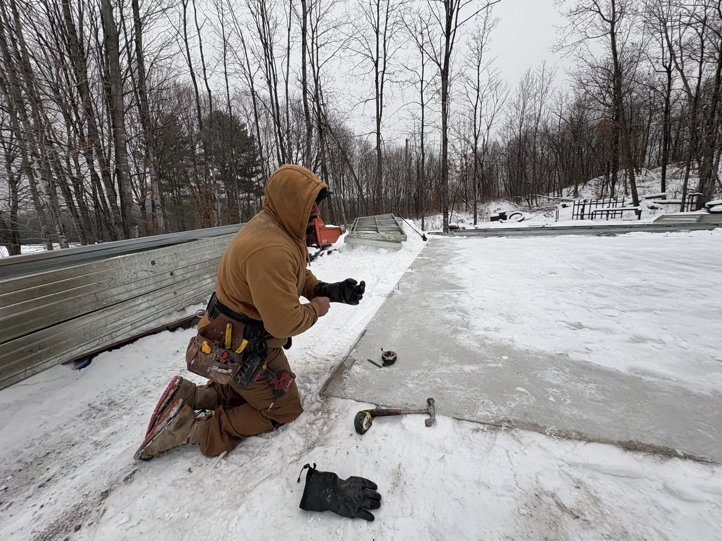 Alex measuring slab.jpeg
