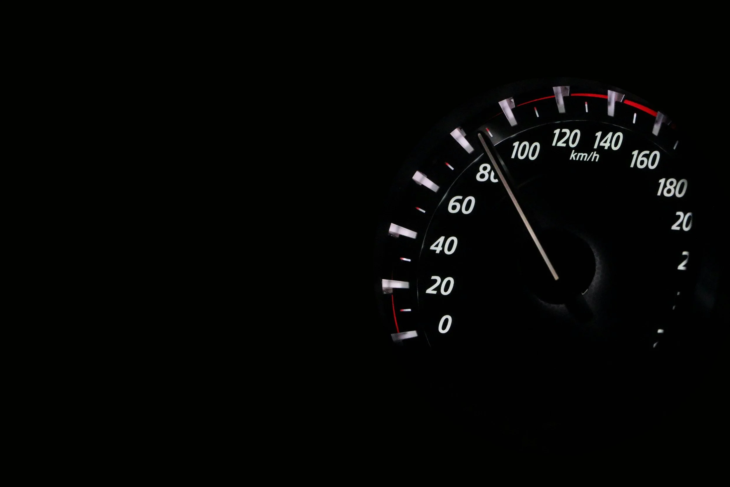 Illuminated vehicle speedometer showing speed in kilometers per hour against black background. Understand refusal violations and begin your return-to-duty process with SAP evaluations in Las Vegas, NV.