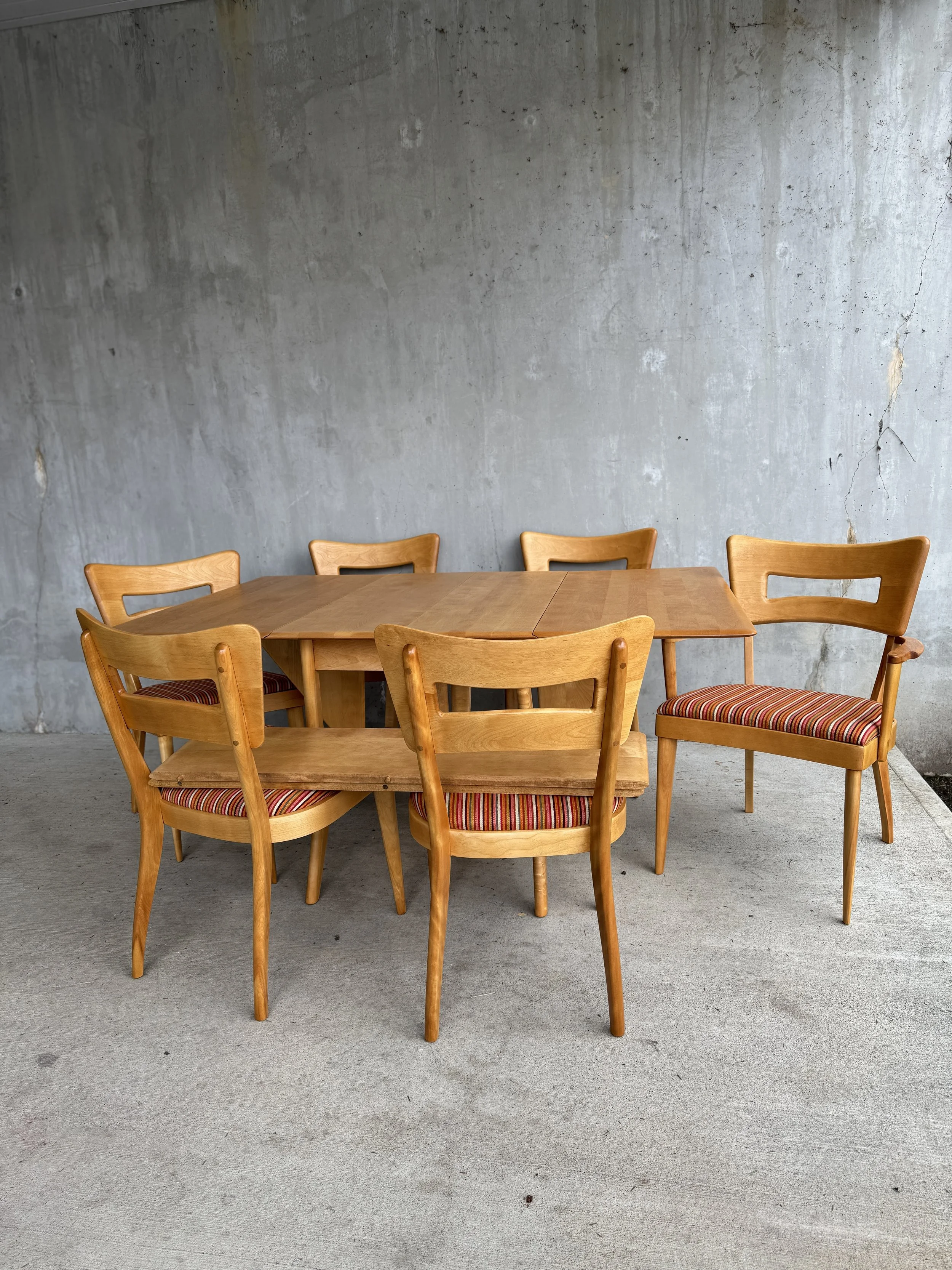 Restored Heywood Wakefield Dogbone mid-century dining set with colorful striped upholstered chair seats