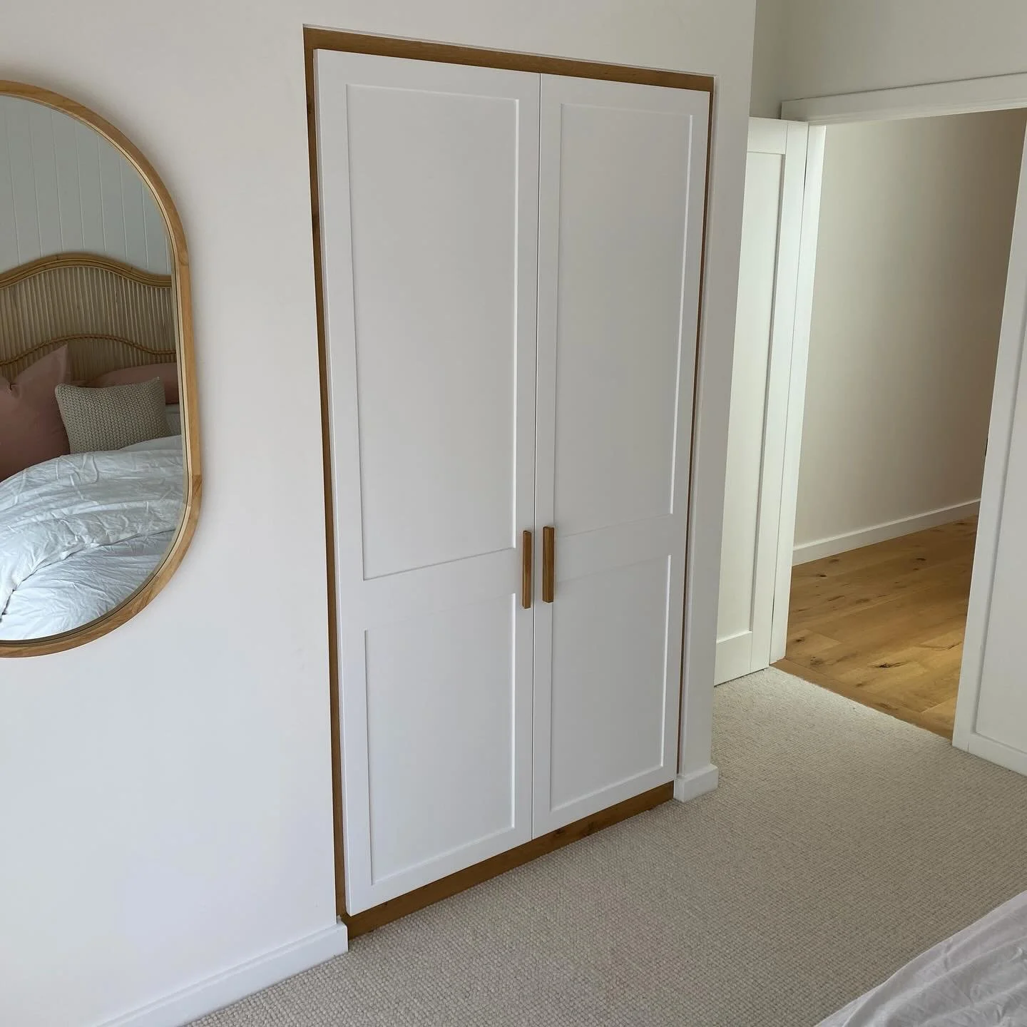 A small robe we completed for a client 😍

- 2 Pac painted shaker doors 
- Surrounds done in the timber flooring used in the house
- Equipped with adjustable shelves and stainless steel hanging rail 
- Timber handles to tie the theme together