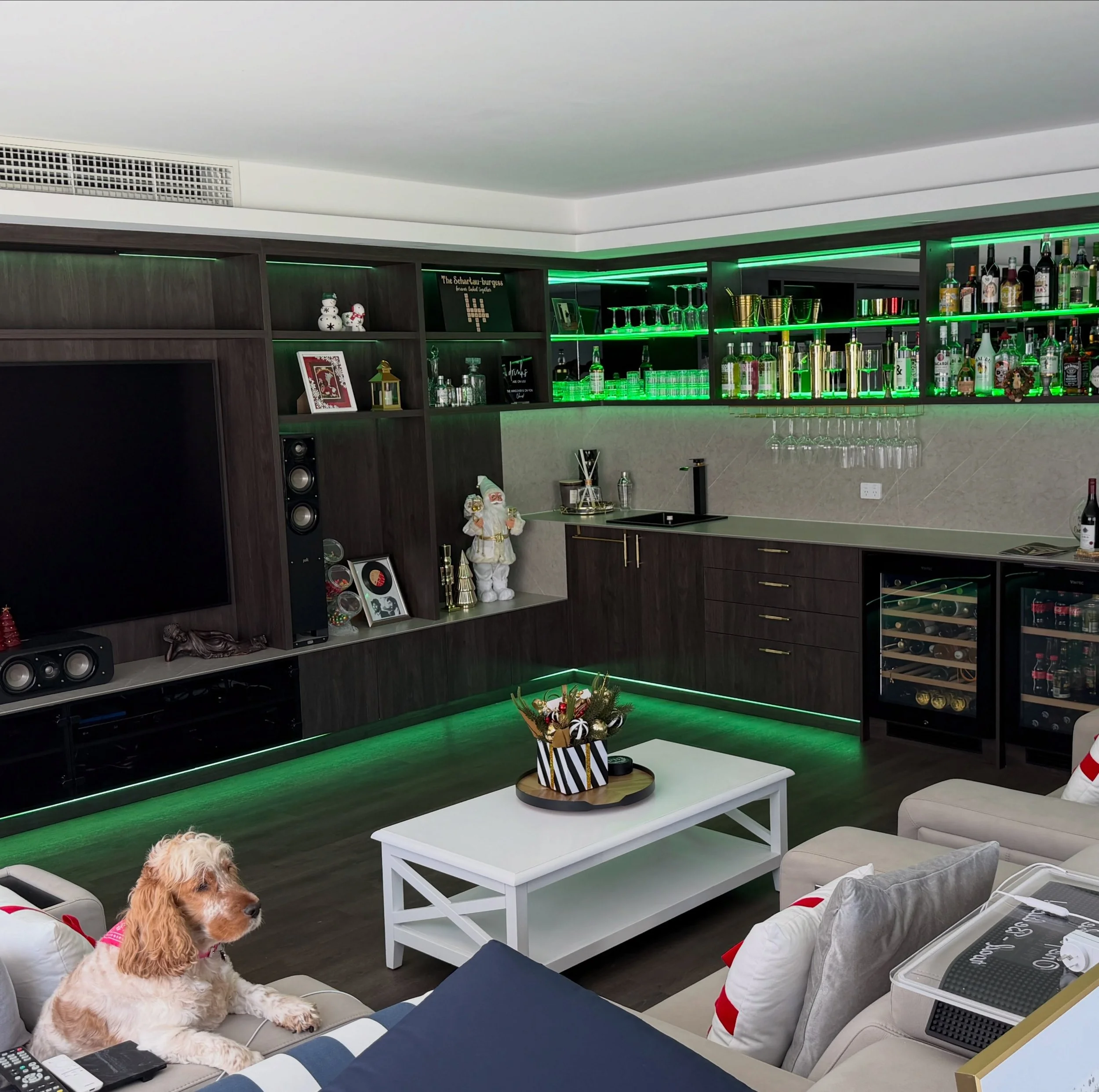 Custom TV &amp; Bar in Mindarie 

- Custom Glass Doors 
- Custom Glass Shelves 
- Custom Curved Glass Shelves 
- Smoked Mirror backing to Overheads 
- @forgehardware_melbourne Brass Glass Door Hinges 
- @hafele_aus RGB lighting 
- Custom Brass Wine R