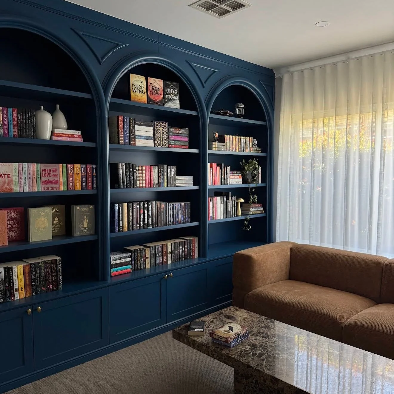 Blue Arches 💙 

(A throwback to a project that was completed a few years ago by Dylan)

This project included:

- @laminexau 18mm MDF boards
- @loandcointeriors Almond Brass Knob Handles
- Custom painted panels &amp; doors
- Custom made arches to su