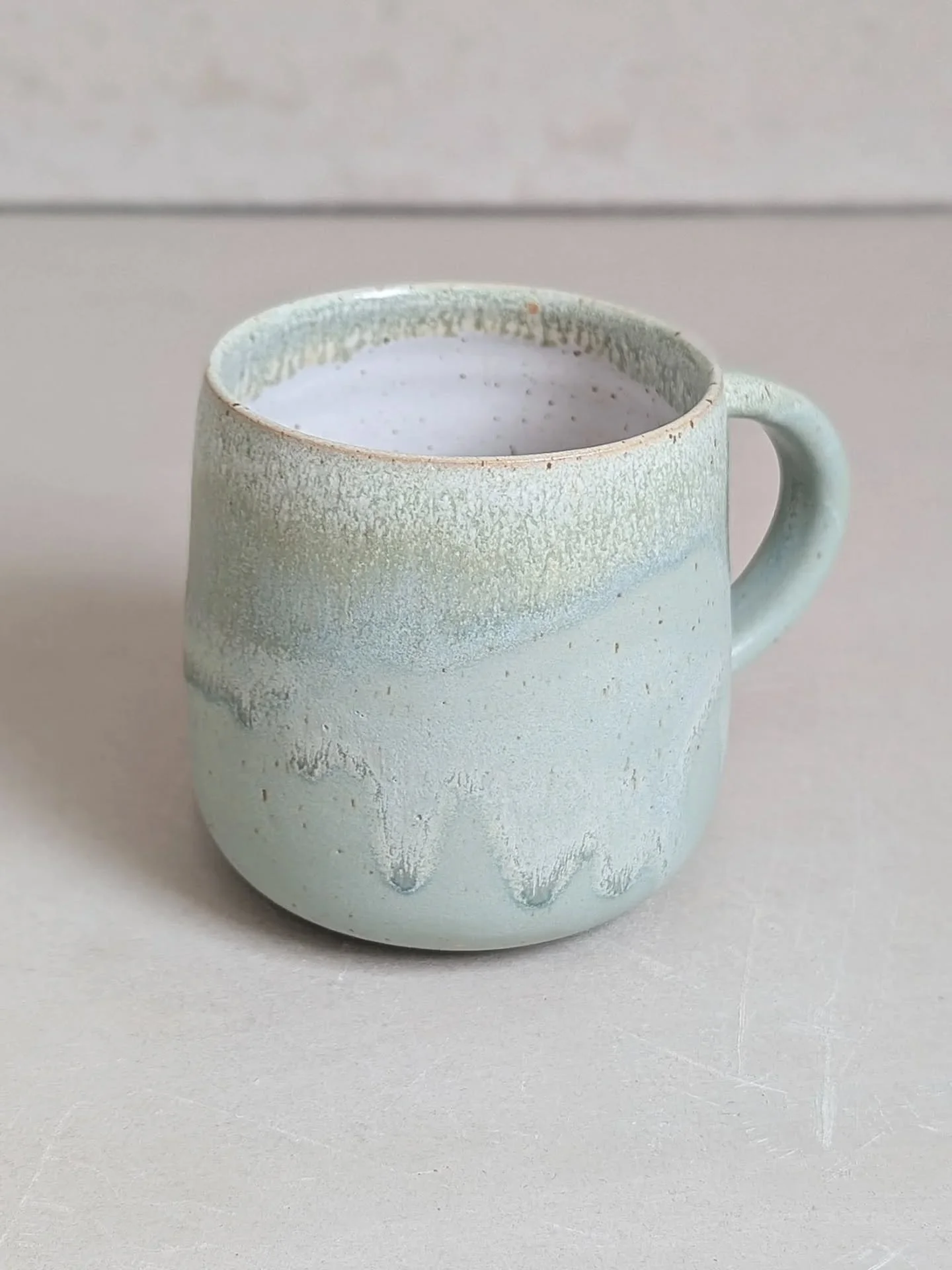 Sea green celadon mug 💚🌊💚

It's matt in places, glossy in other places, the textures and colours made by this glaze are different every time and I love it 🤩

#ceramicmug #mugs #mugshot #potterymug #stoneware #wheelthrown #makermade #madeinclay #c