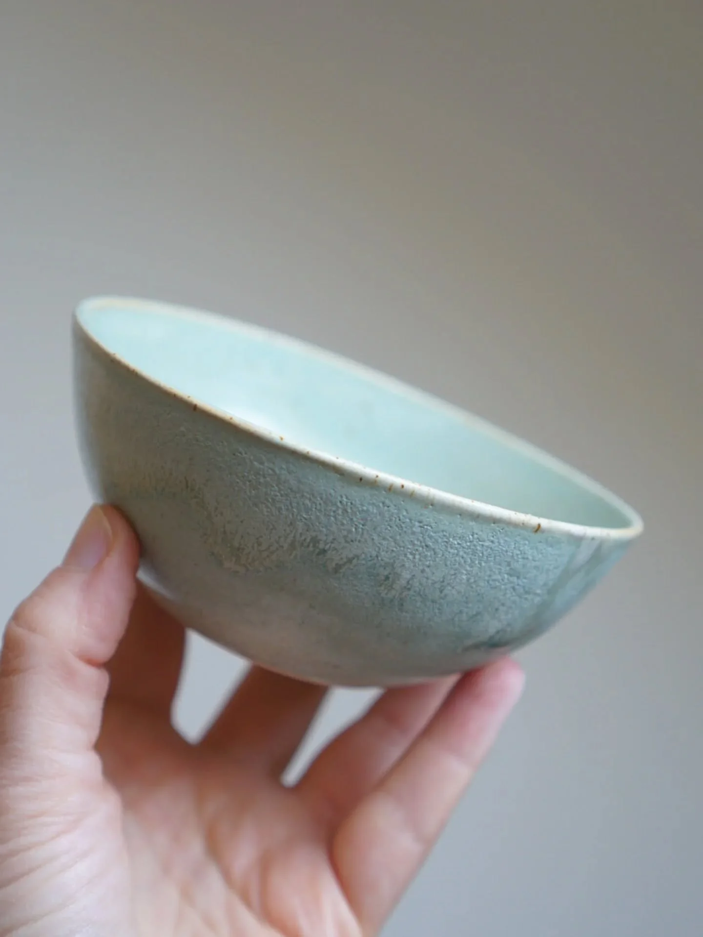 Having a hard time parting with this little bowl 🥹 she's a little bit warped on the rim, but something about her size, thinness and glaze just makes me happy ☺️