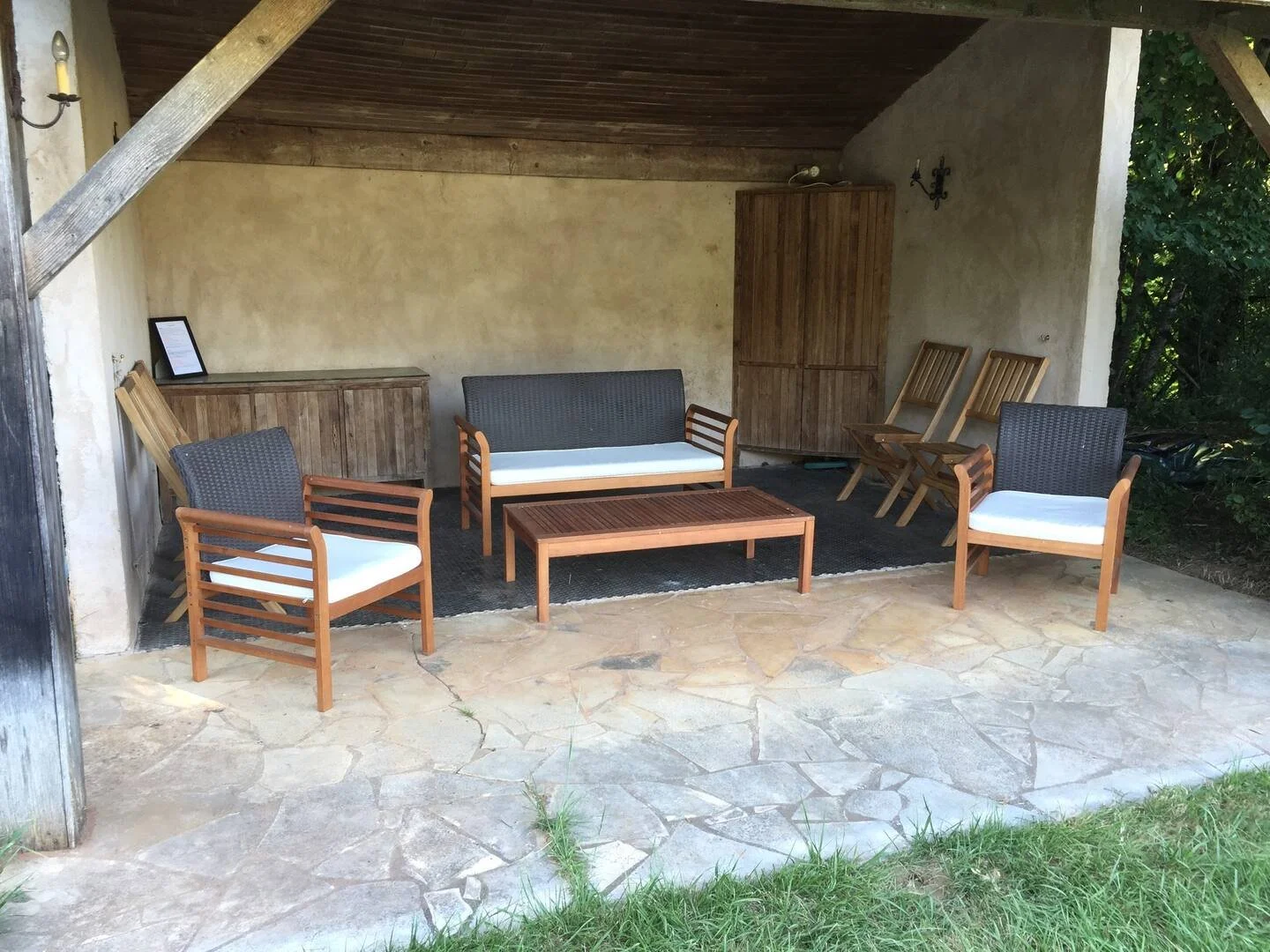 Outside seating near the pool at Domaine de Tabary