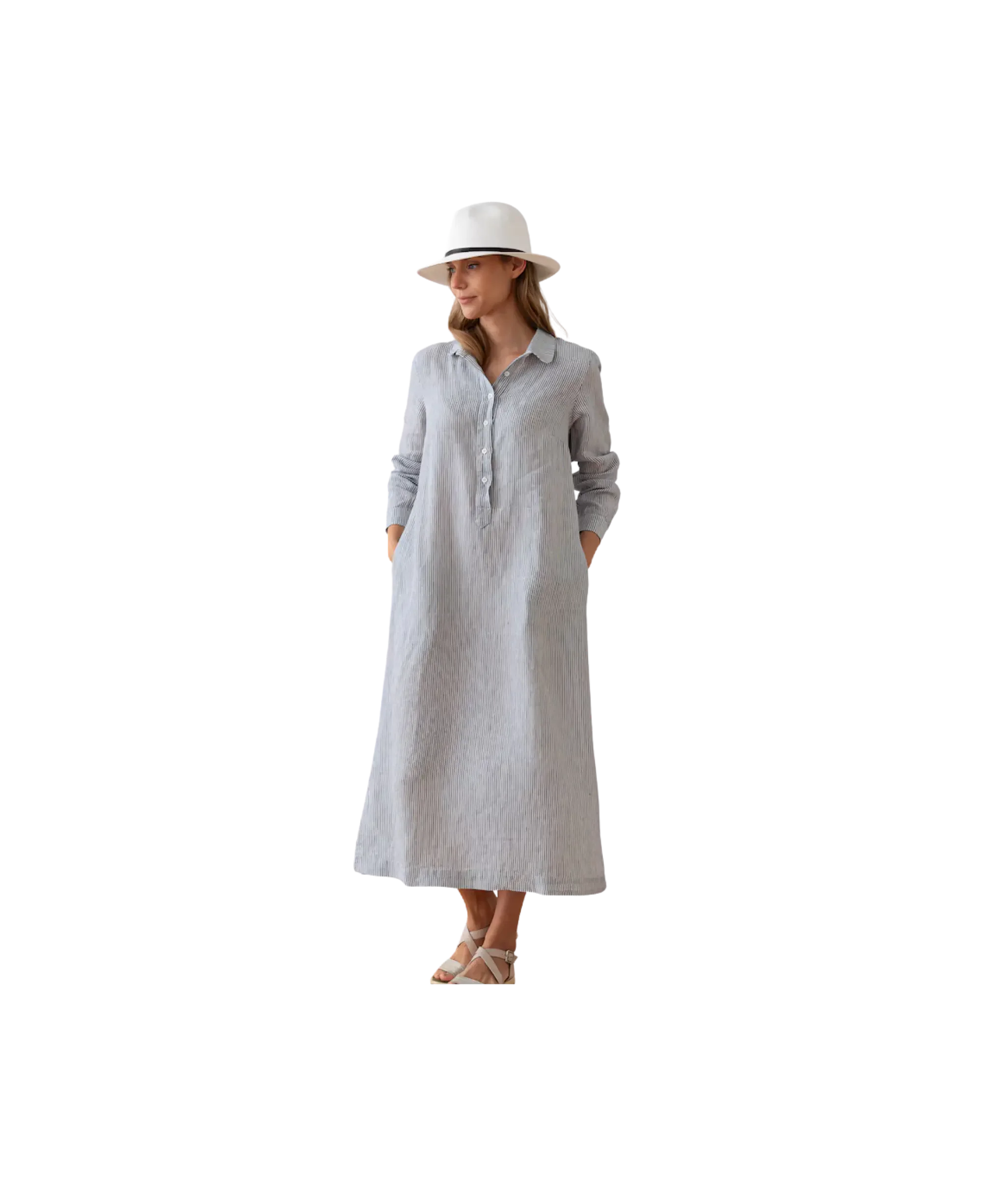 Woman wearing a minimalist European flax linen maxi dress with long sleeves, paired with a hat and sandals, sustainable handmade linen clothing for women.