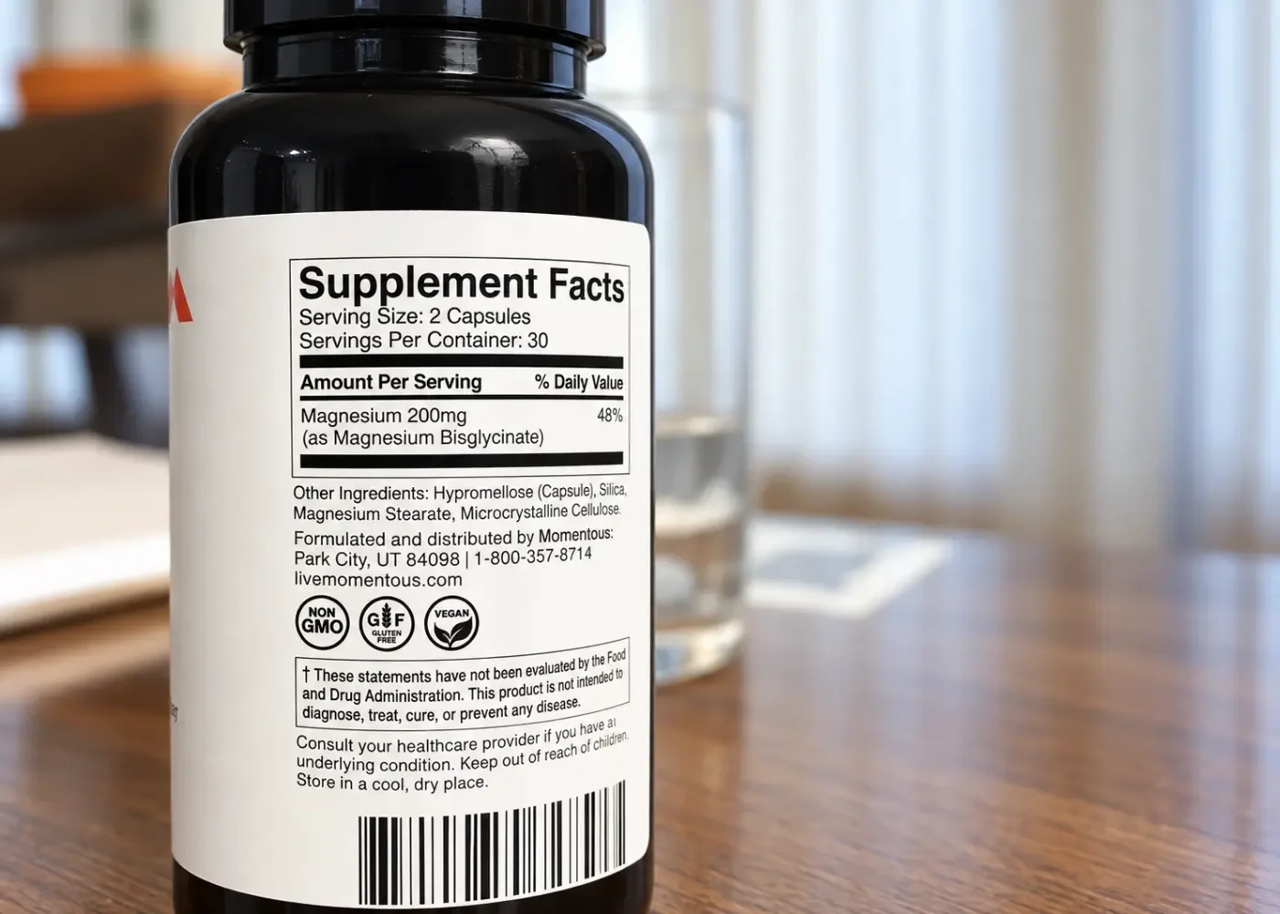 Momentous Magnesium Bisglycinate Supplement Facts label showing 200 mg of magnesium per two-capsule serving and the ingredient list.