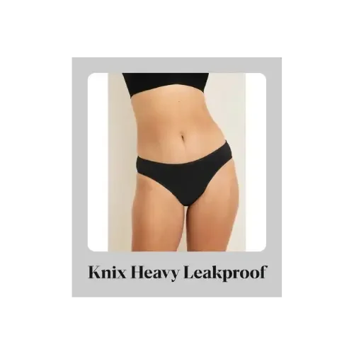 Model wearing black Knix Heavy Leakproof bikini underwear.