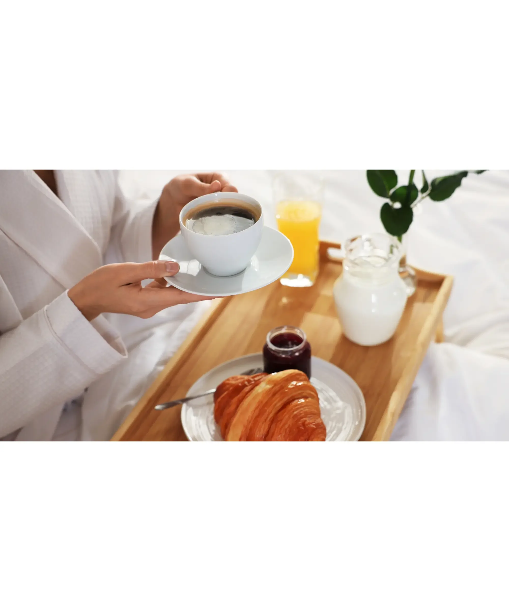 slow living morning routine with coffee and breakfast tray in bed, representing slow living in a busy world, mindful habits, calm lifestyle, and intentional living