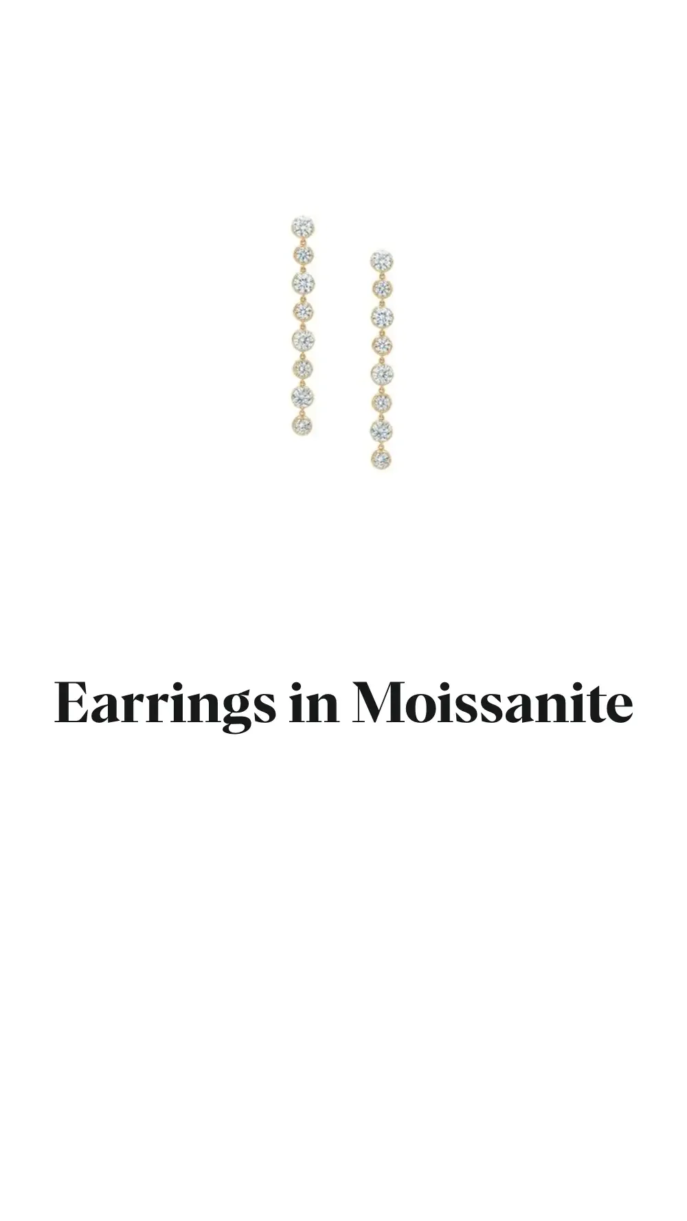 Long drop earrings with alternating large and small round moissanite stones in gold-toned settings on a white background.