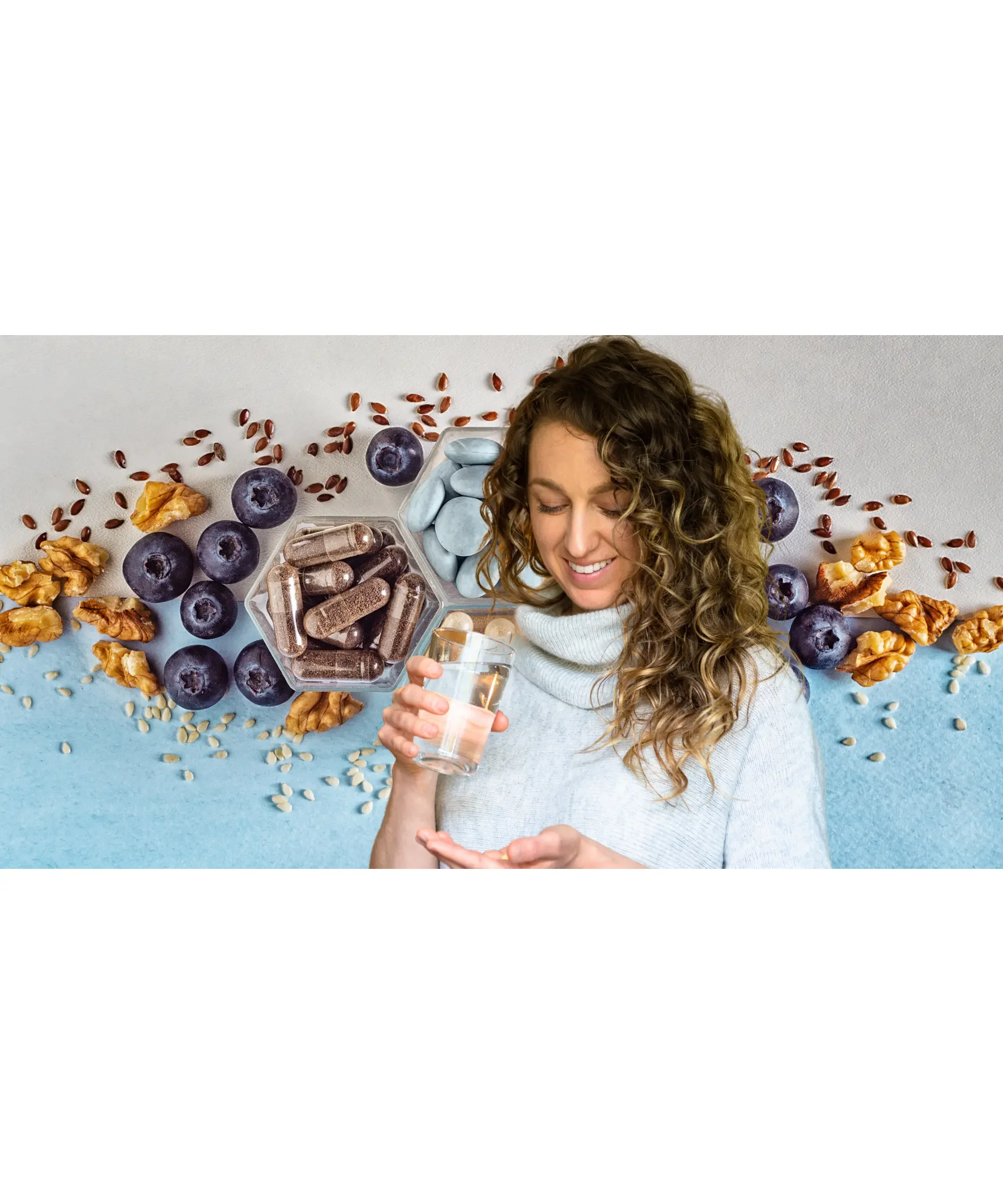 Woman taking supplements with water, surrounded by berries, nuts, and capsules, representing nutrition and health support.