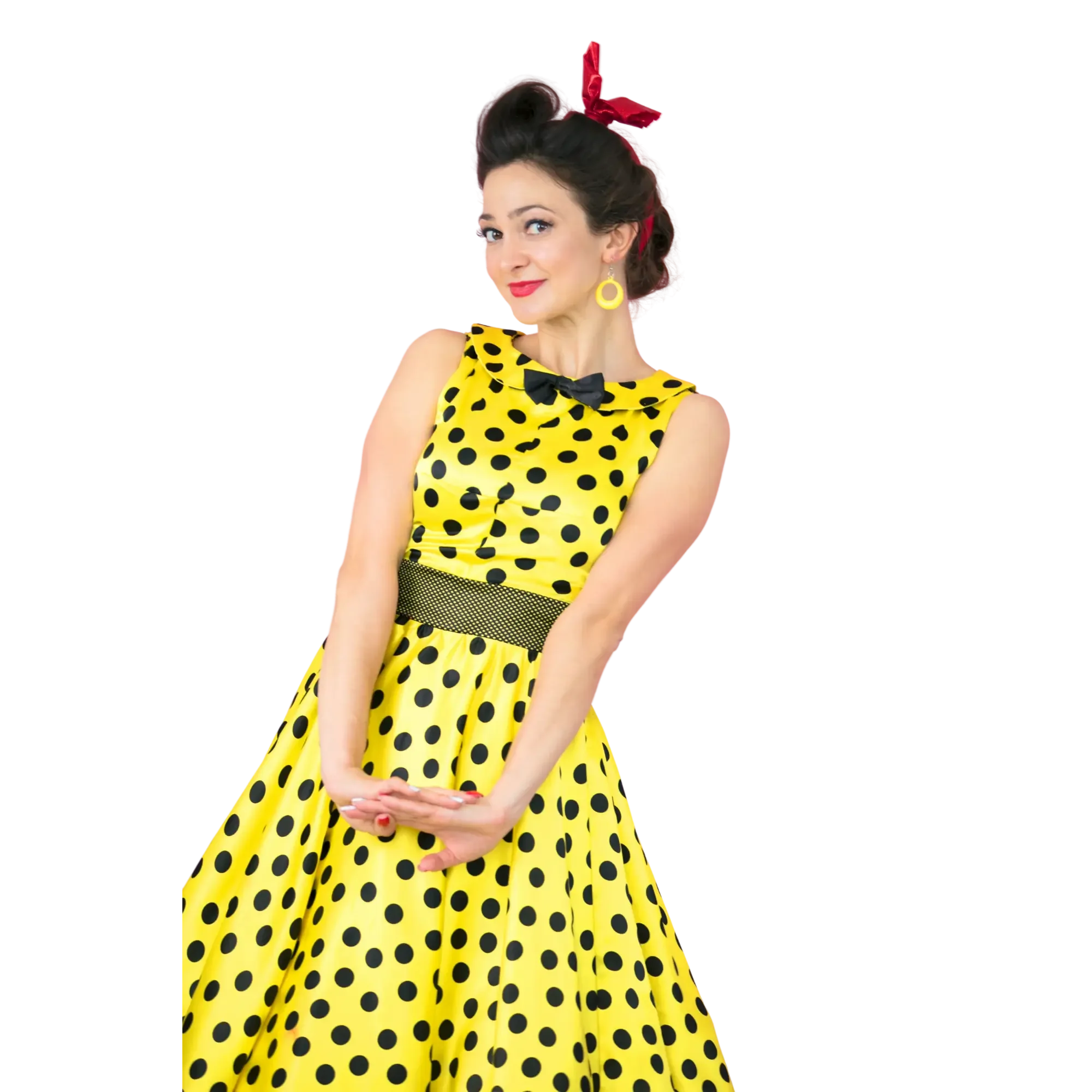 retro woman wearing a yellow dress with dots, red lipstick and posing