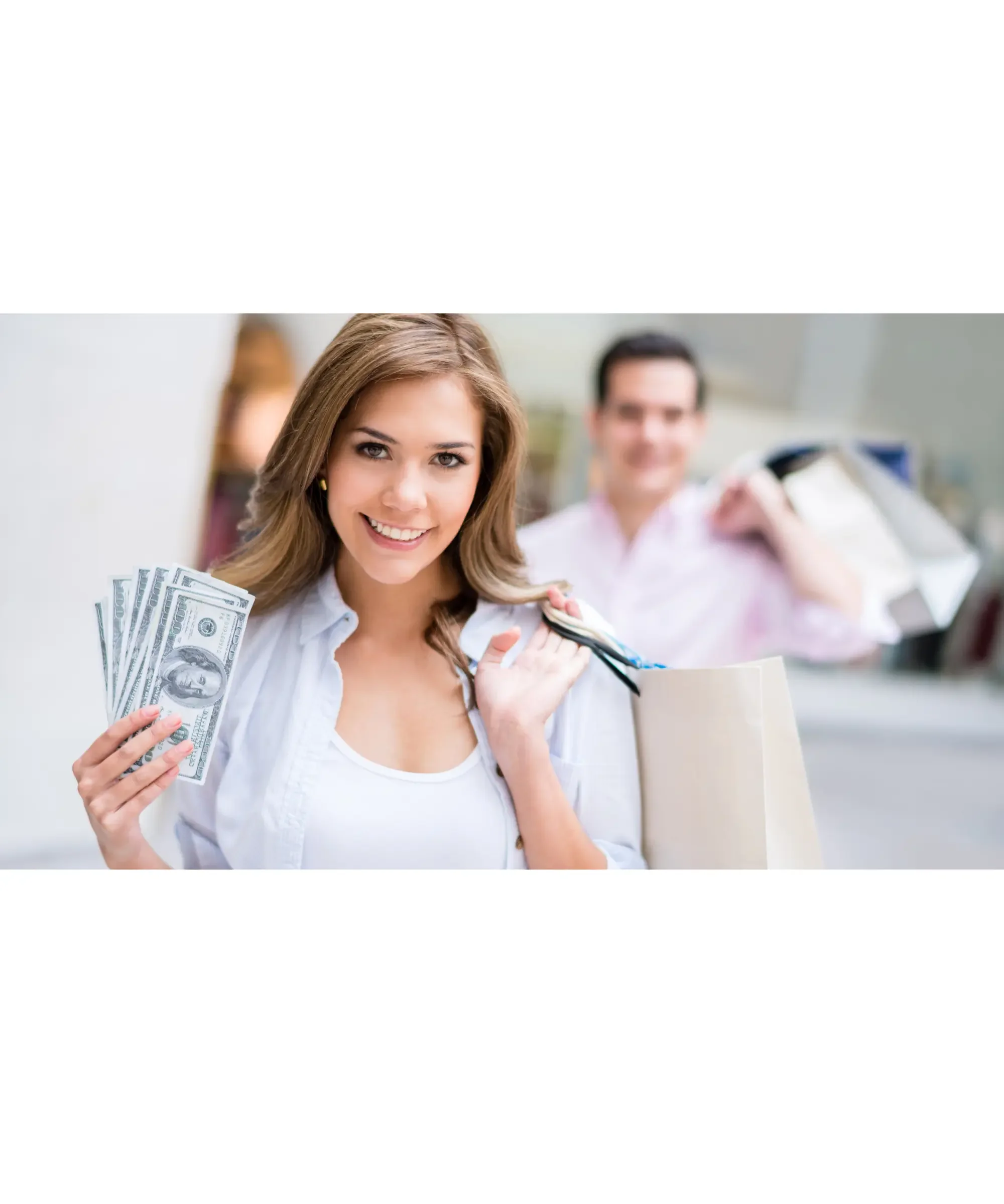 Smiling woman holding cash and shopping bags in a store setting, representing smart shopping decisions, saving money on home appliances, and confident consumer choices.