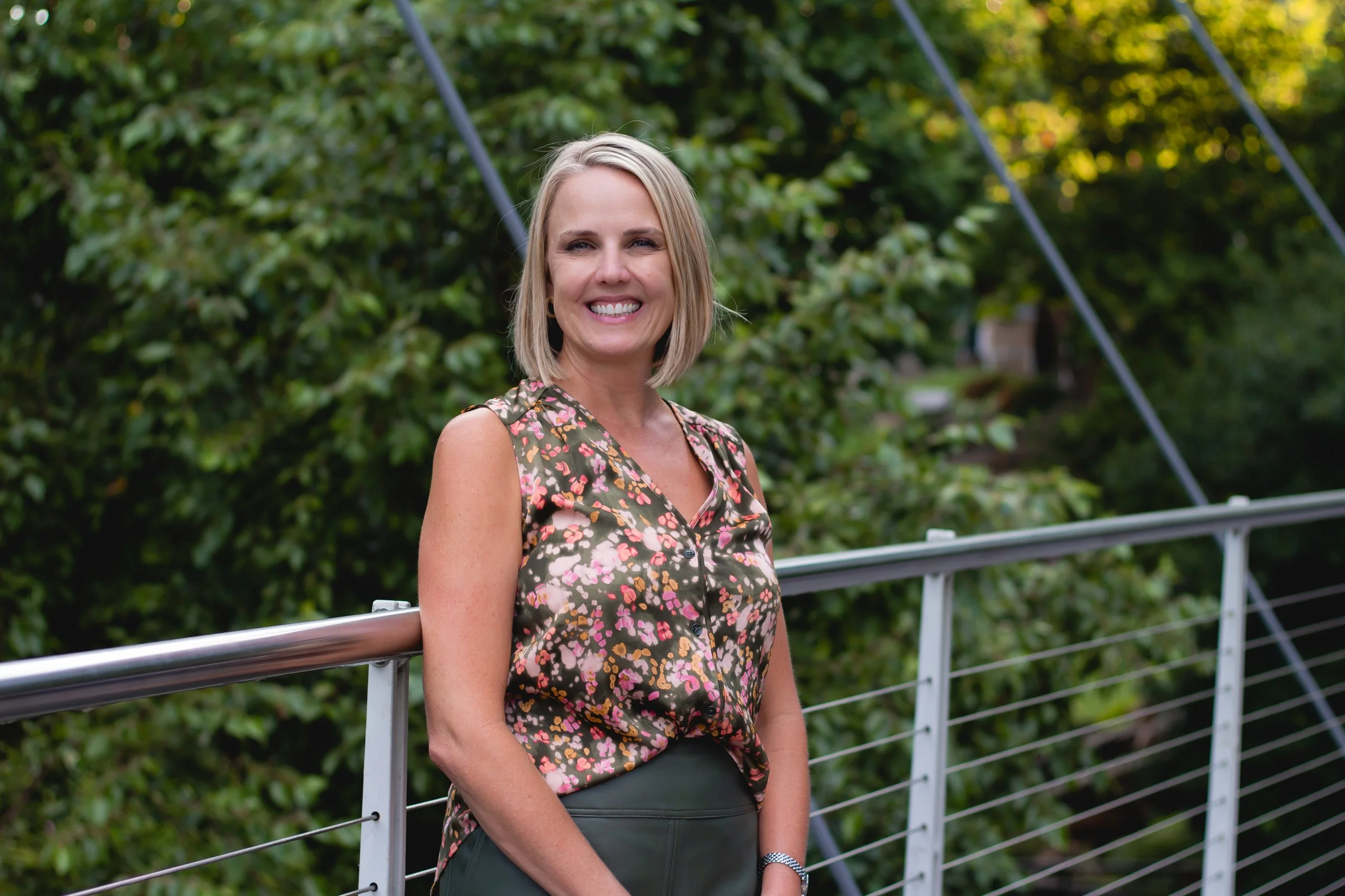 therapist on bridge in park