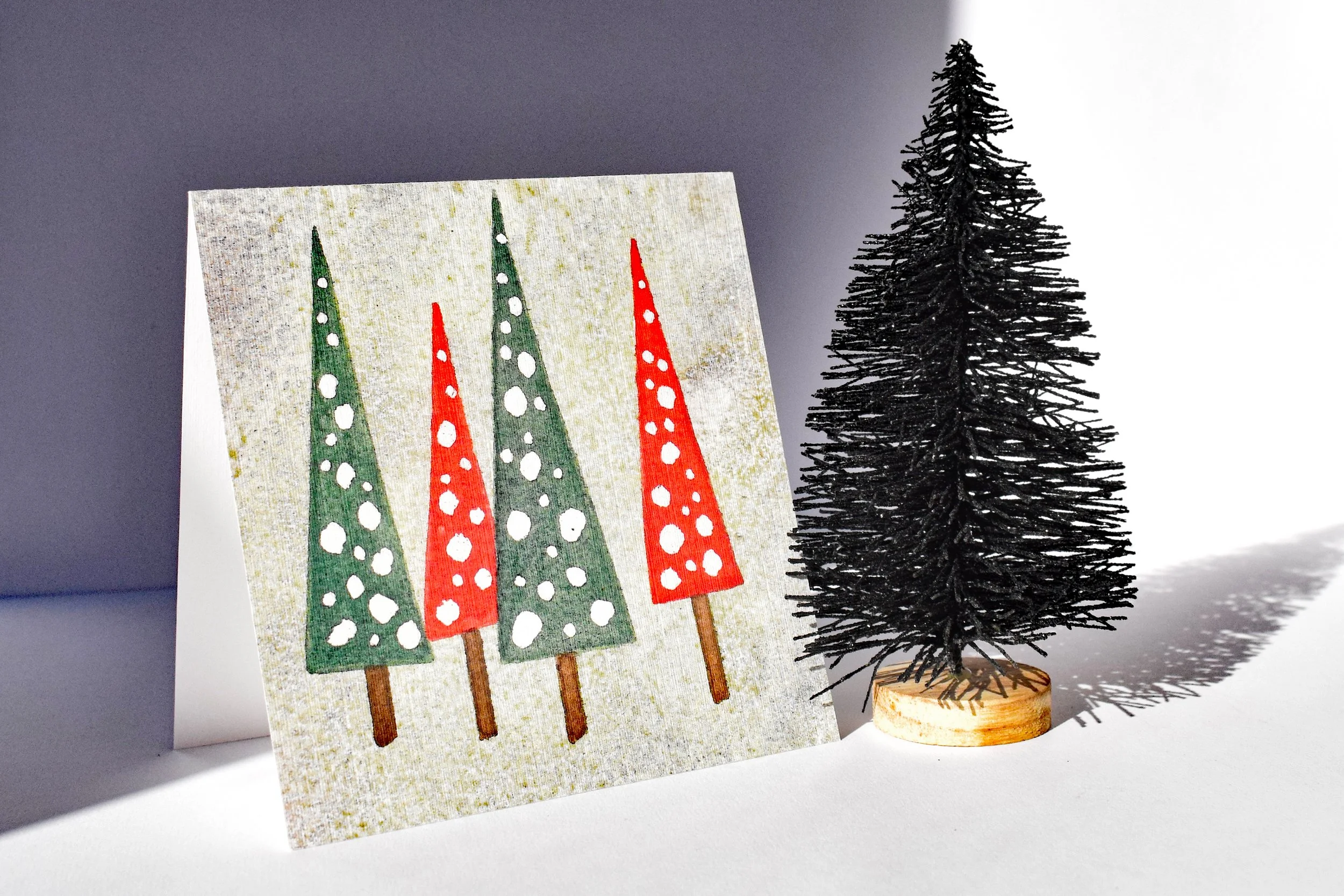Green background Xmas trees front.jpg