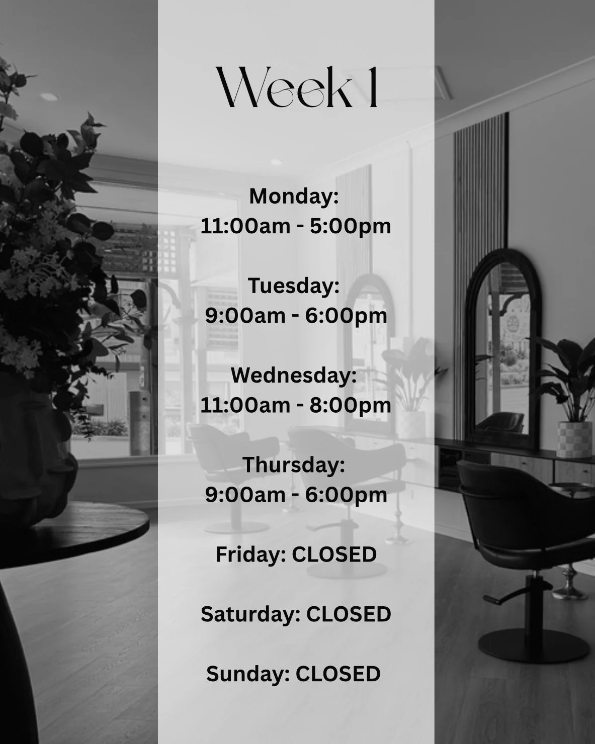 A sign displaying weekly hours on a transparent board in a modern interior space with chairs, a large mirror, and plants, showing the open days and times from Monday to Thursday, and closed on Friday to Sunday.