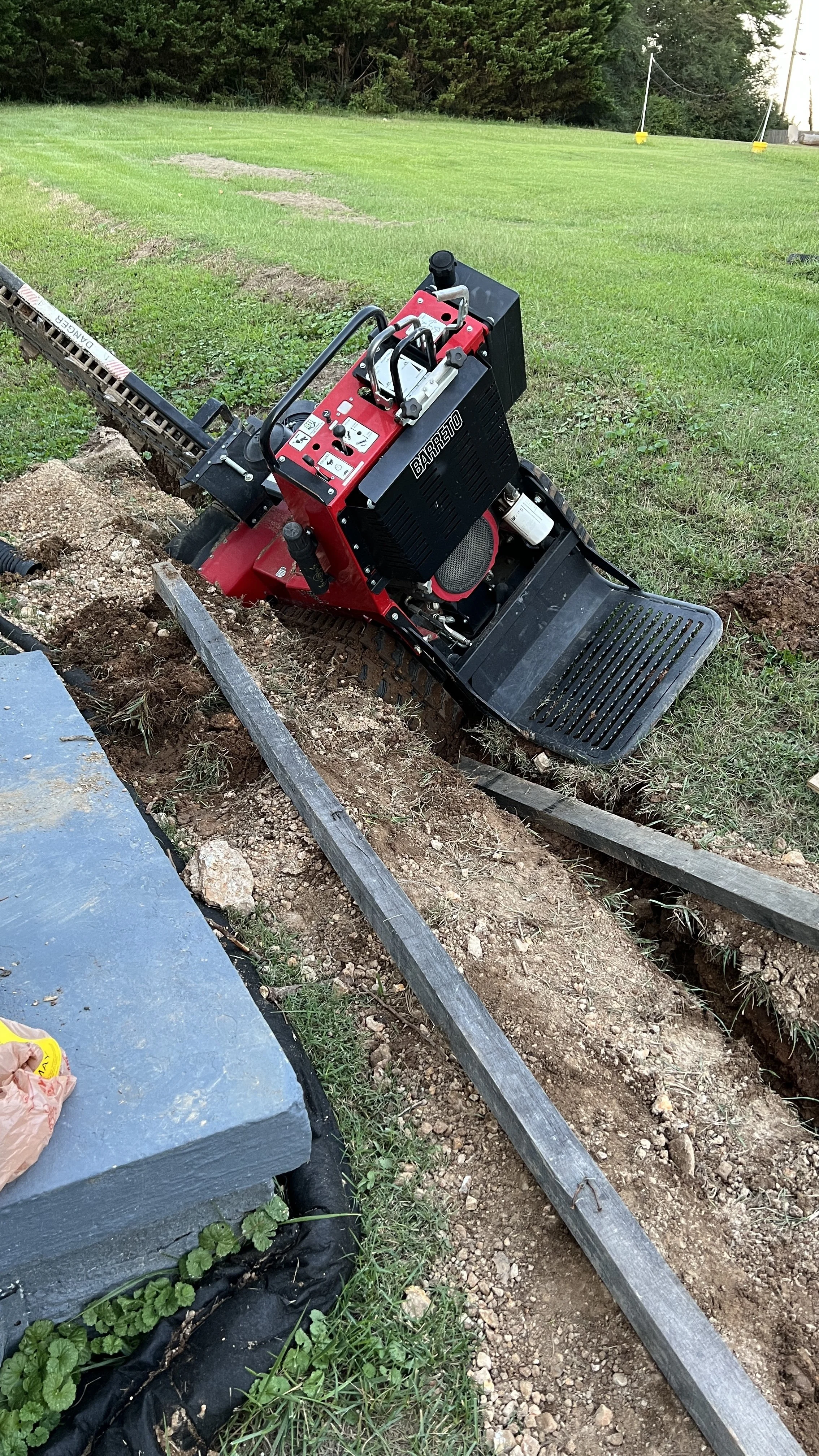 DIY French Drain Chaos in East Ridge: Scott, a Trencher, and the Neighbors Who Saved Us
