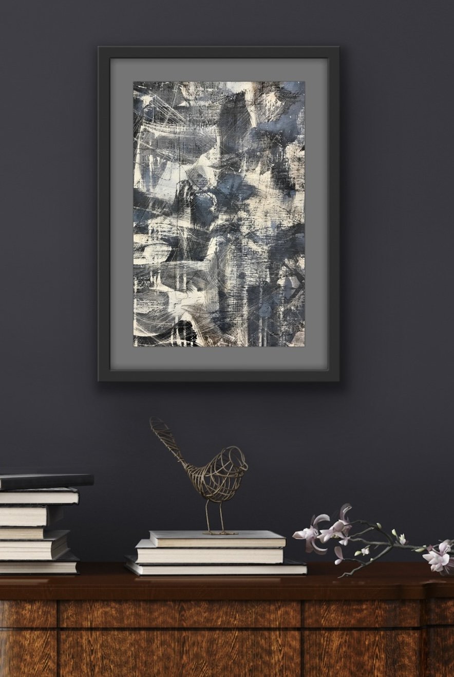 Framed Abstract art print with pale blue and soft gray tones and textured layered brushwork.