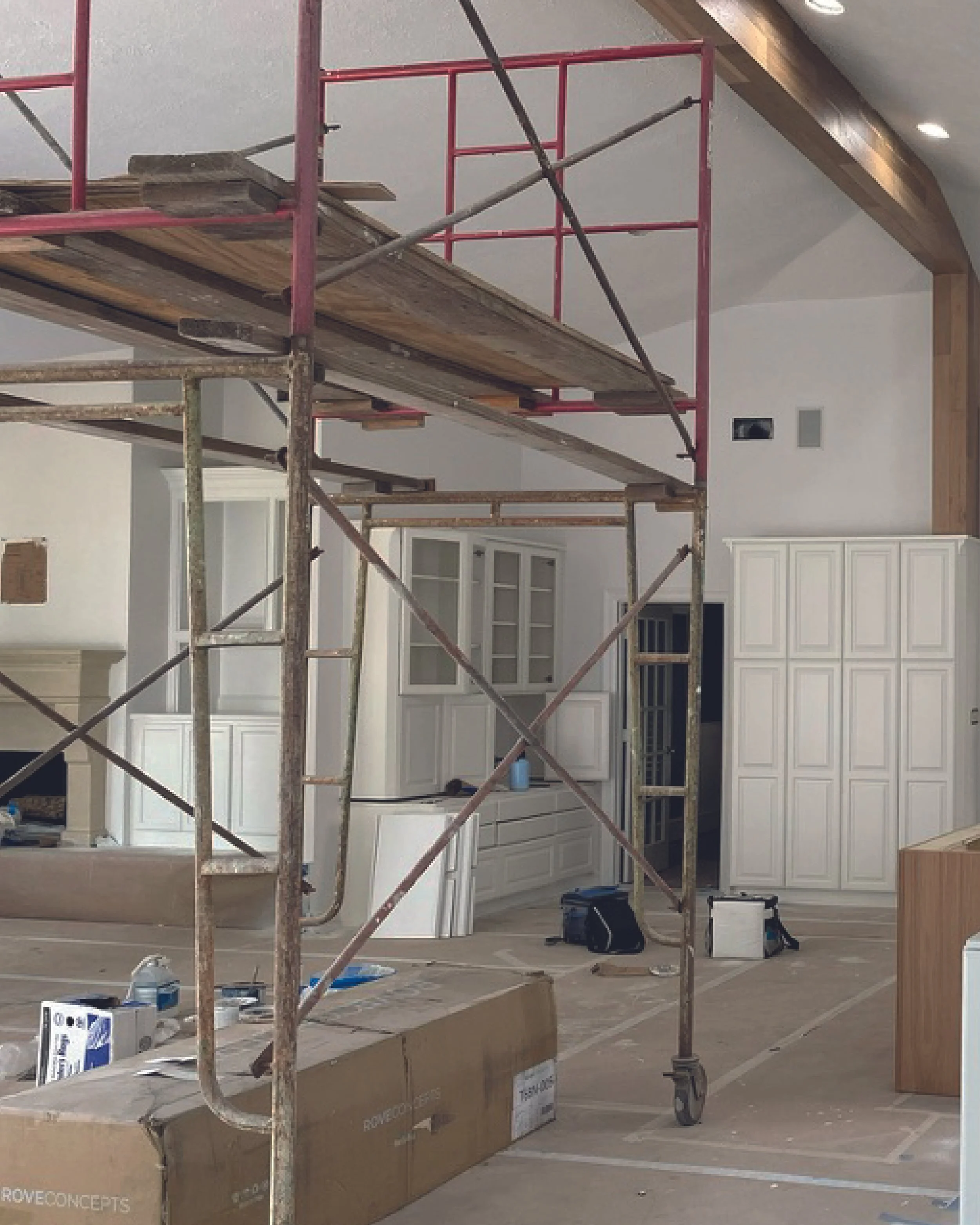 “Modern kitchen renovation featuring a double-height ceiling.