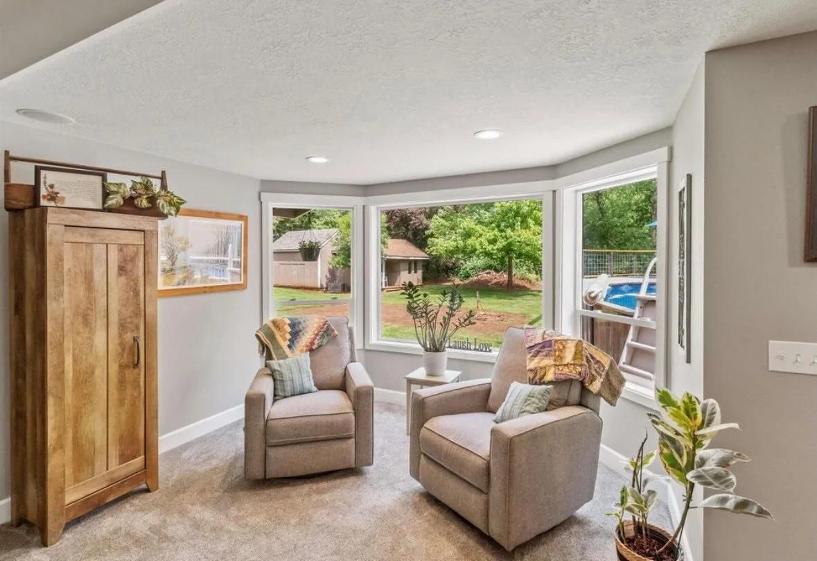 Love this bay window sitting area with a view of the yard and pool 😍 open house tomorrow, May 17th! 2:00-4:00