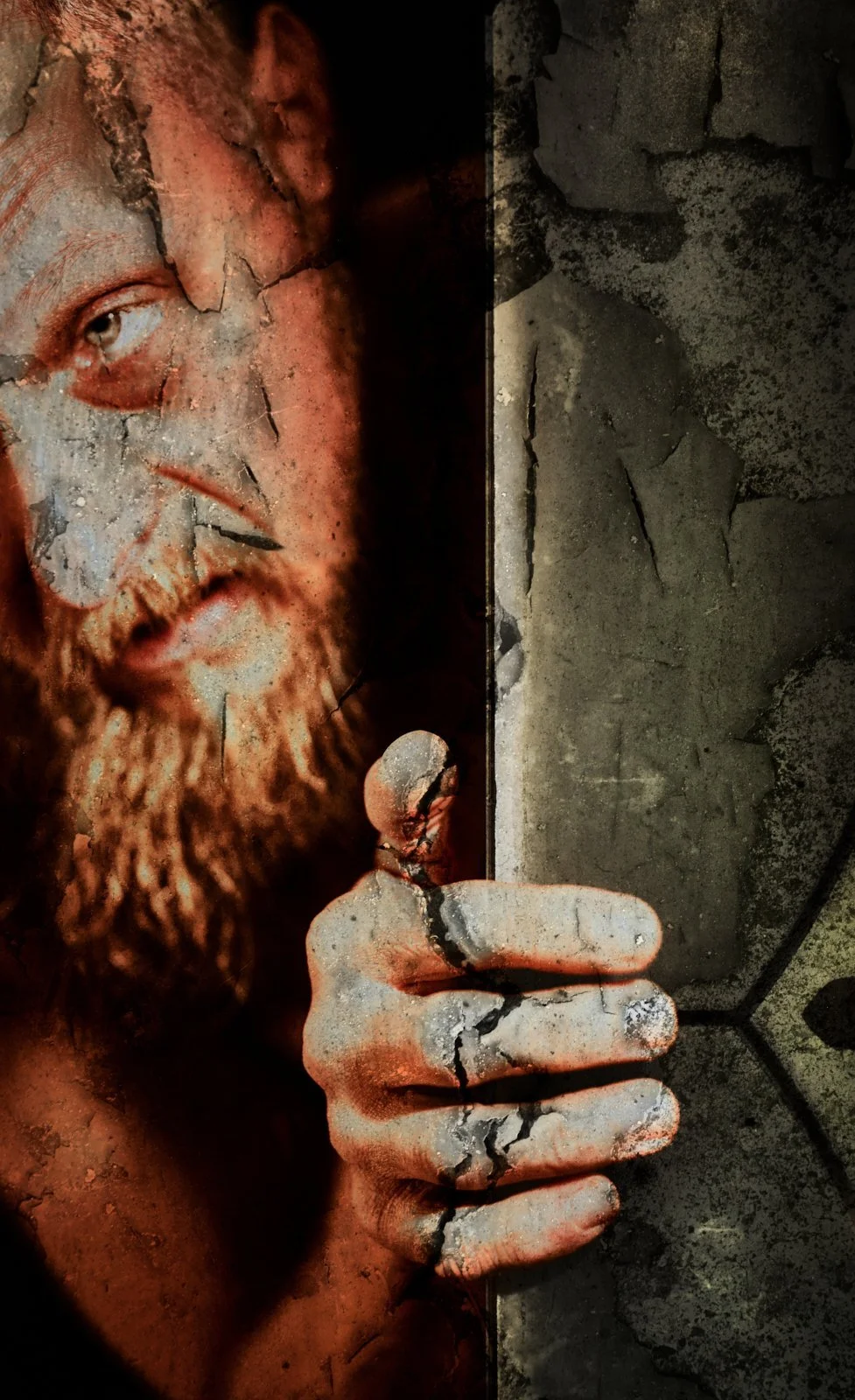A digital artwork of a man with a beard and long hair, holding a tablet, with a cracked and weathered surface overlay on his face and hand, set against a textured background.