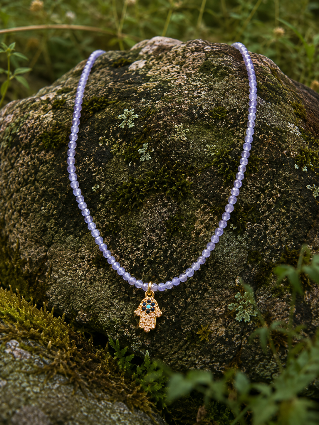 Tanzanite Chamsa necklace.png