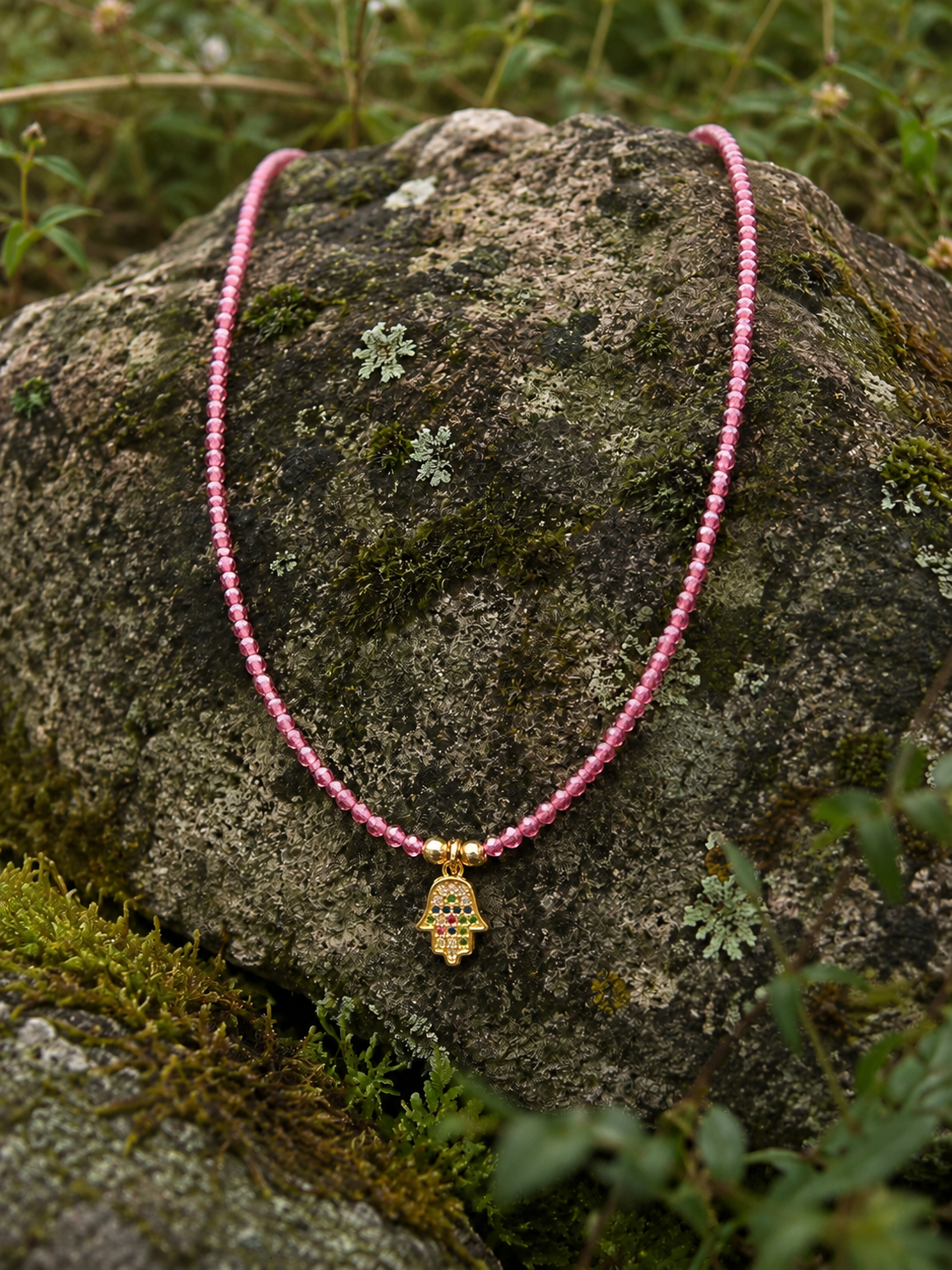 Garnet Chamsa Necklace.png