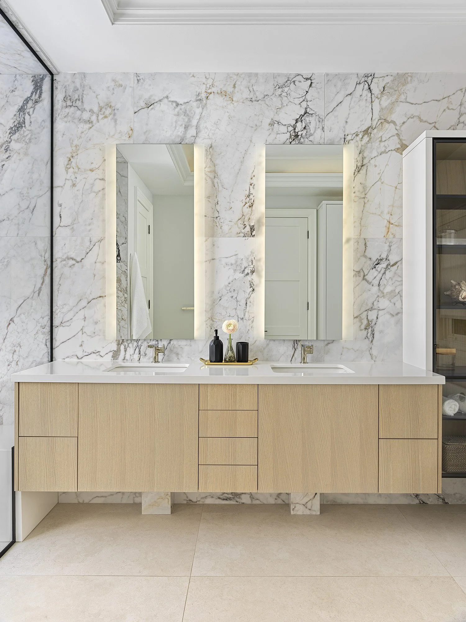 floating vanity with oak cabinets and porcelain tile
