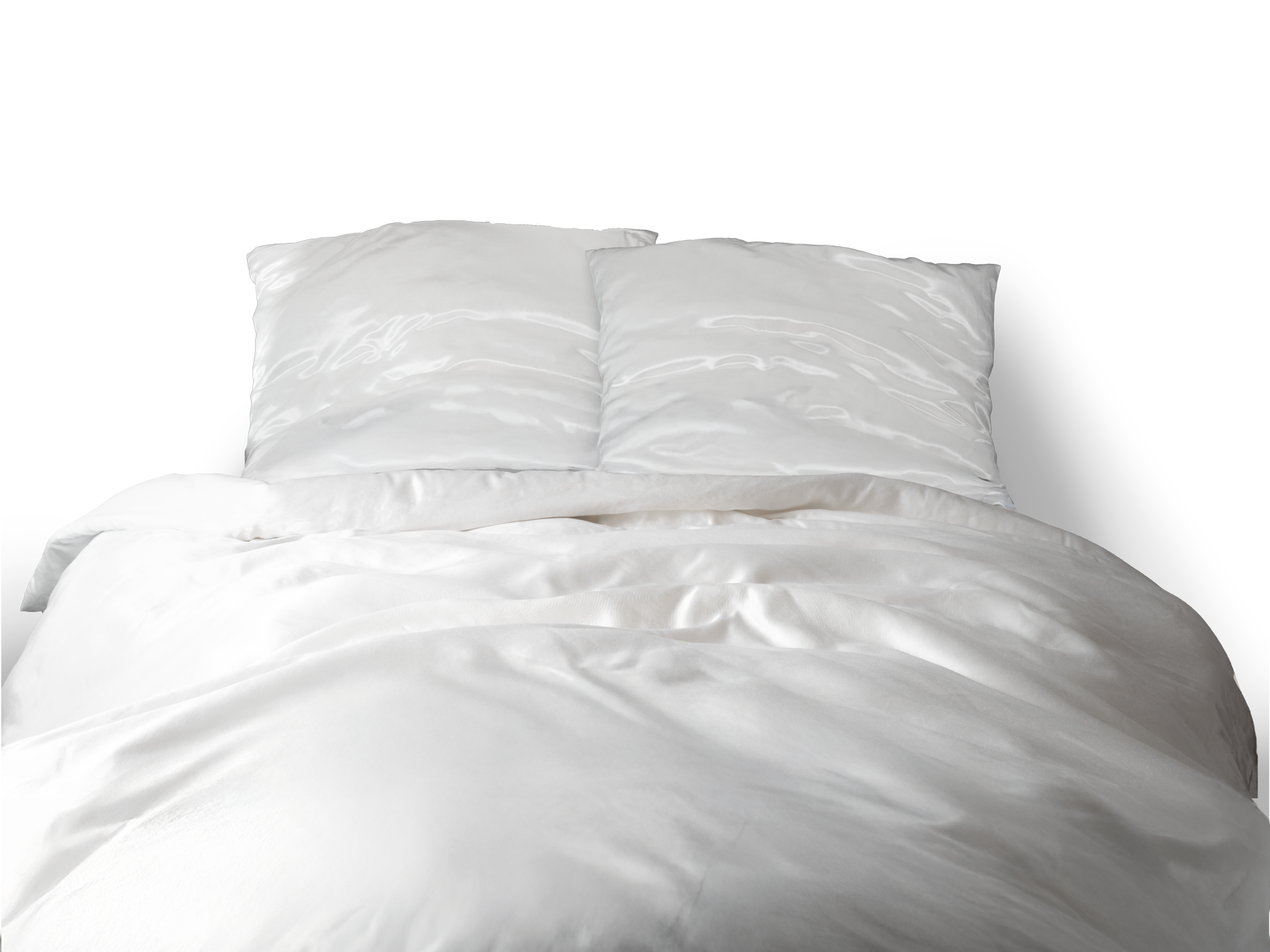 Bett mit weißen Seiden-Bettwäsche und zwei weißen Kissen.
