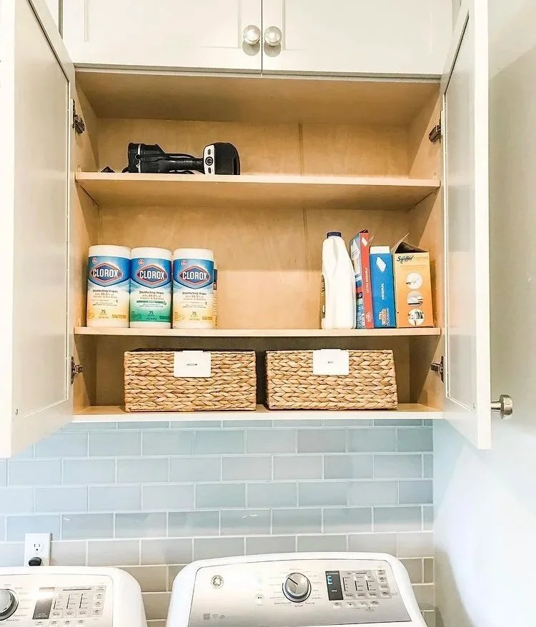 a peaceful home professional residential organization and decluttering project laundry cabinet