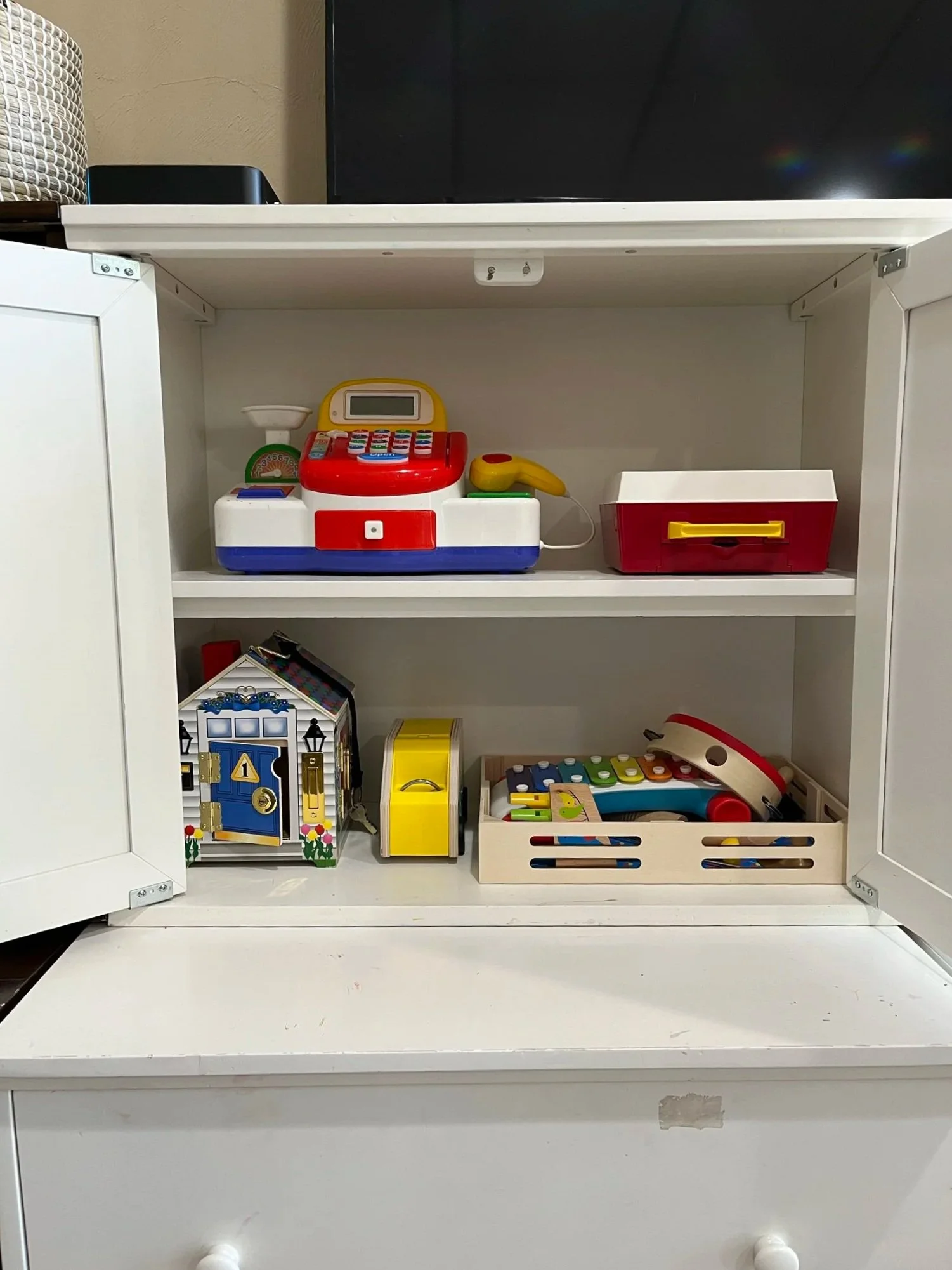 a peaceful home professional organizing reorganized playroom shelves for young children's toys