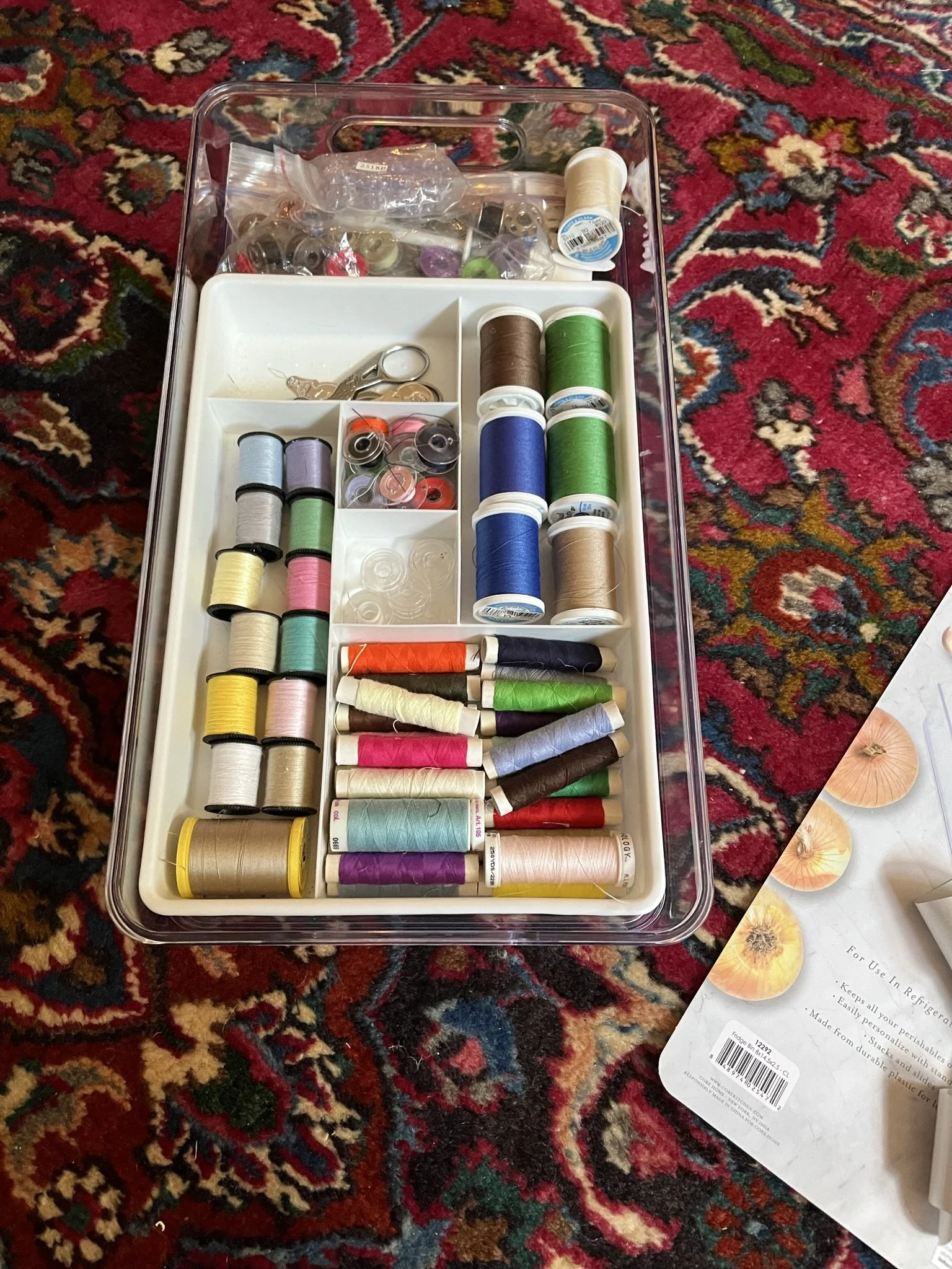 sewing room thread organization from sewing basket close up 