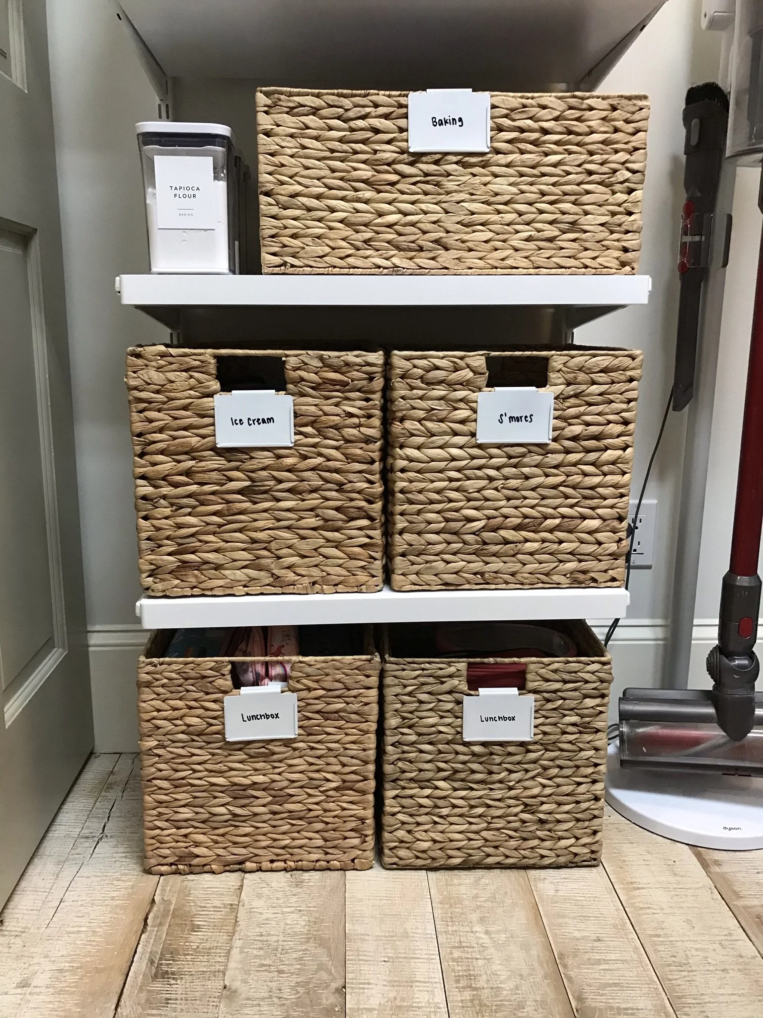 a peaceful home expert decluttering and organized kitchen storage cusotm shelving and baskets with labels