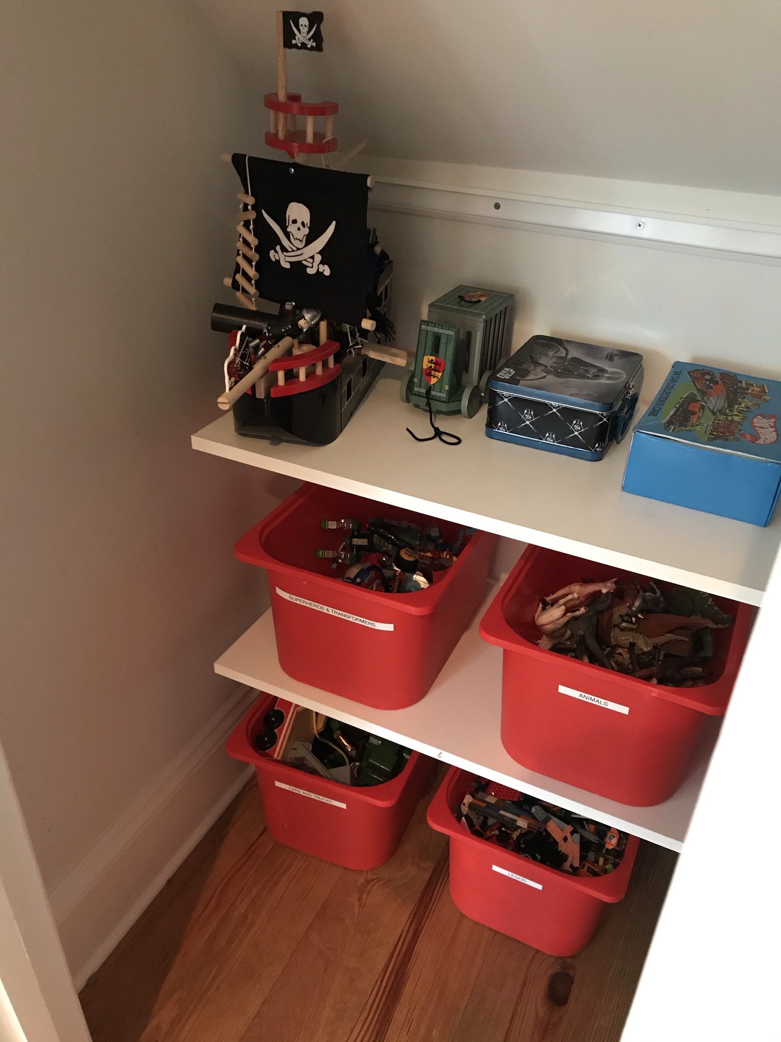 boys organized toy closet with display space