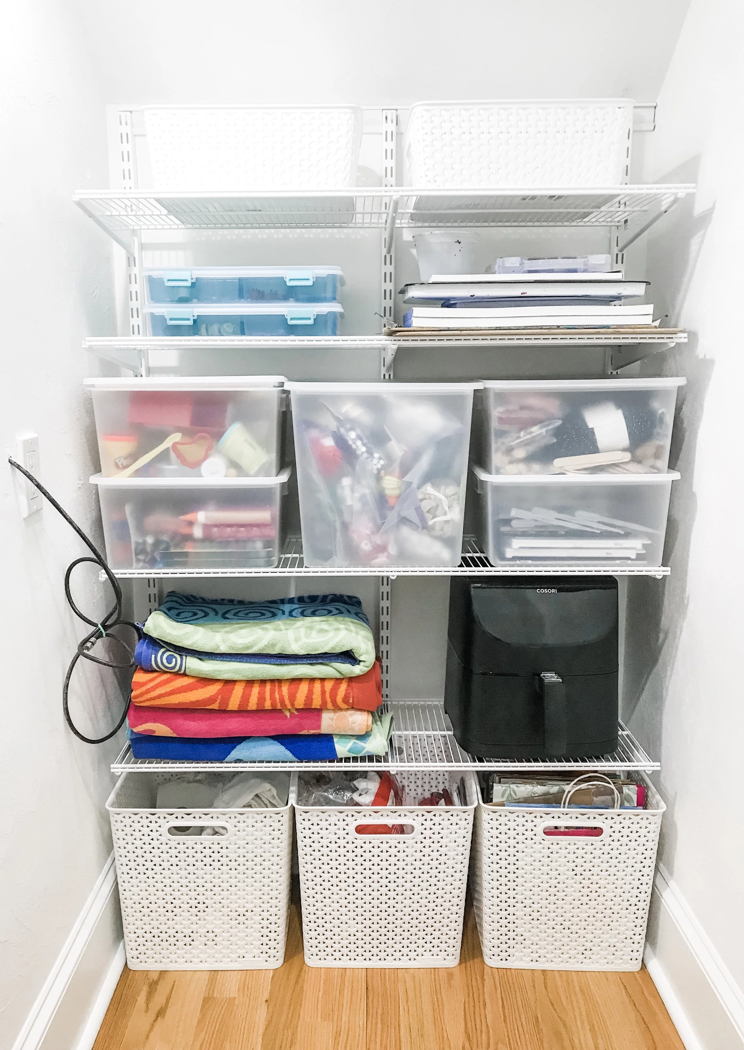 a peaceful home professional residential organization and decluttering project understair storage closet
