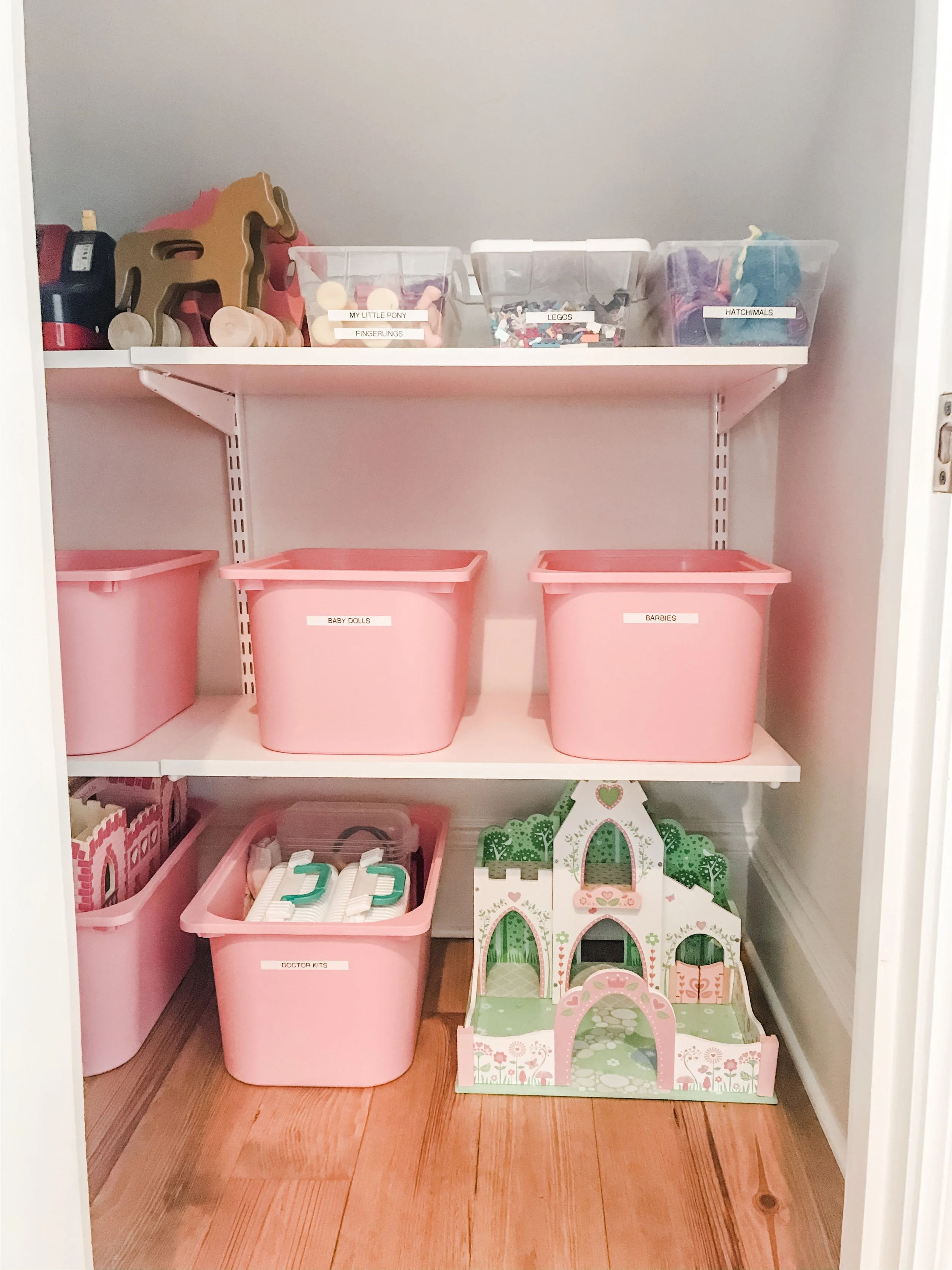 girls organized toy closet