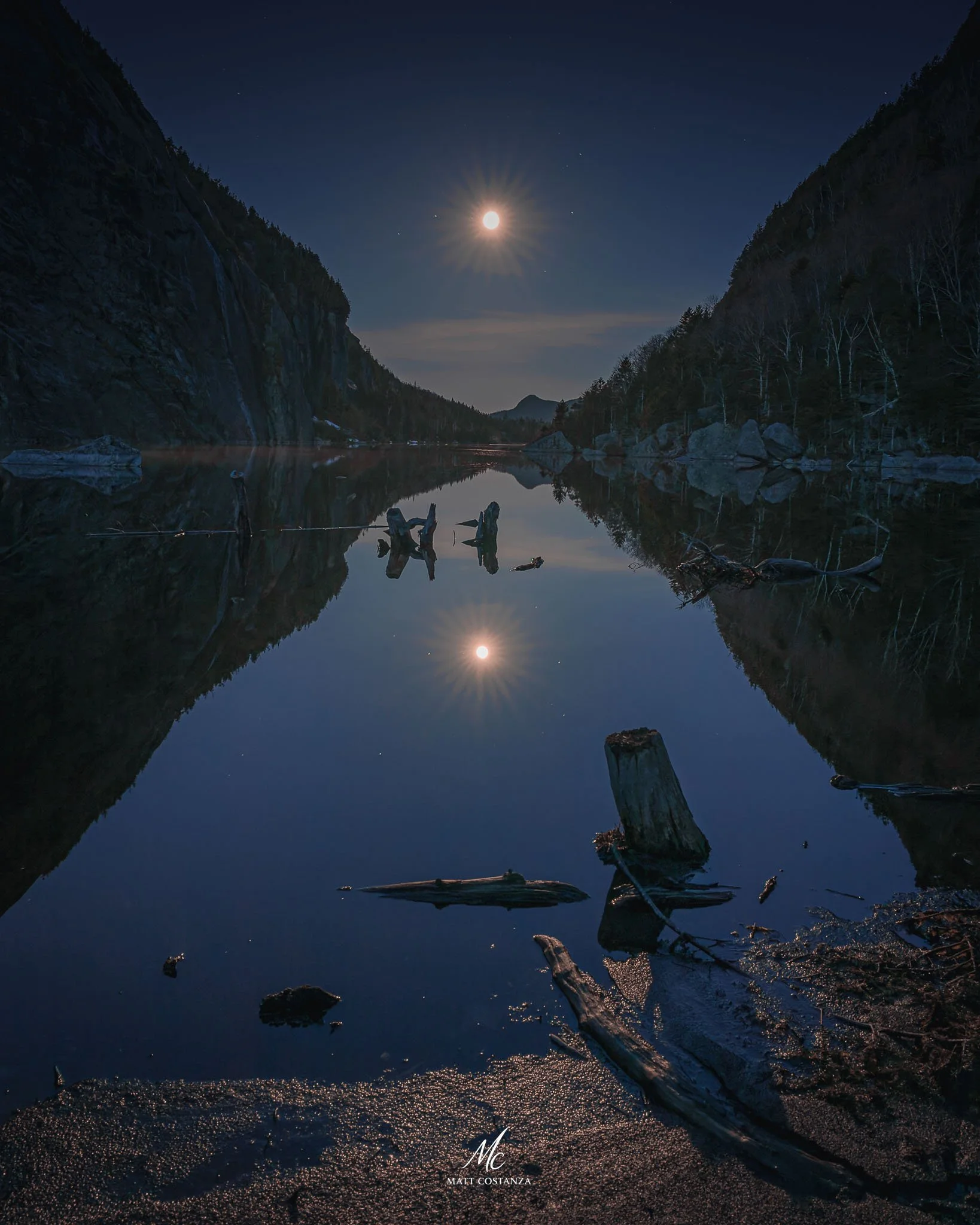 Full moon reflecting on Avalanche Lake, Adirondack High Peaks, New York
