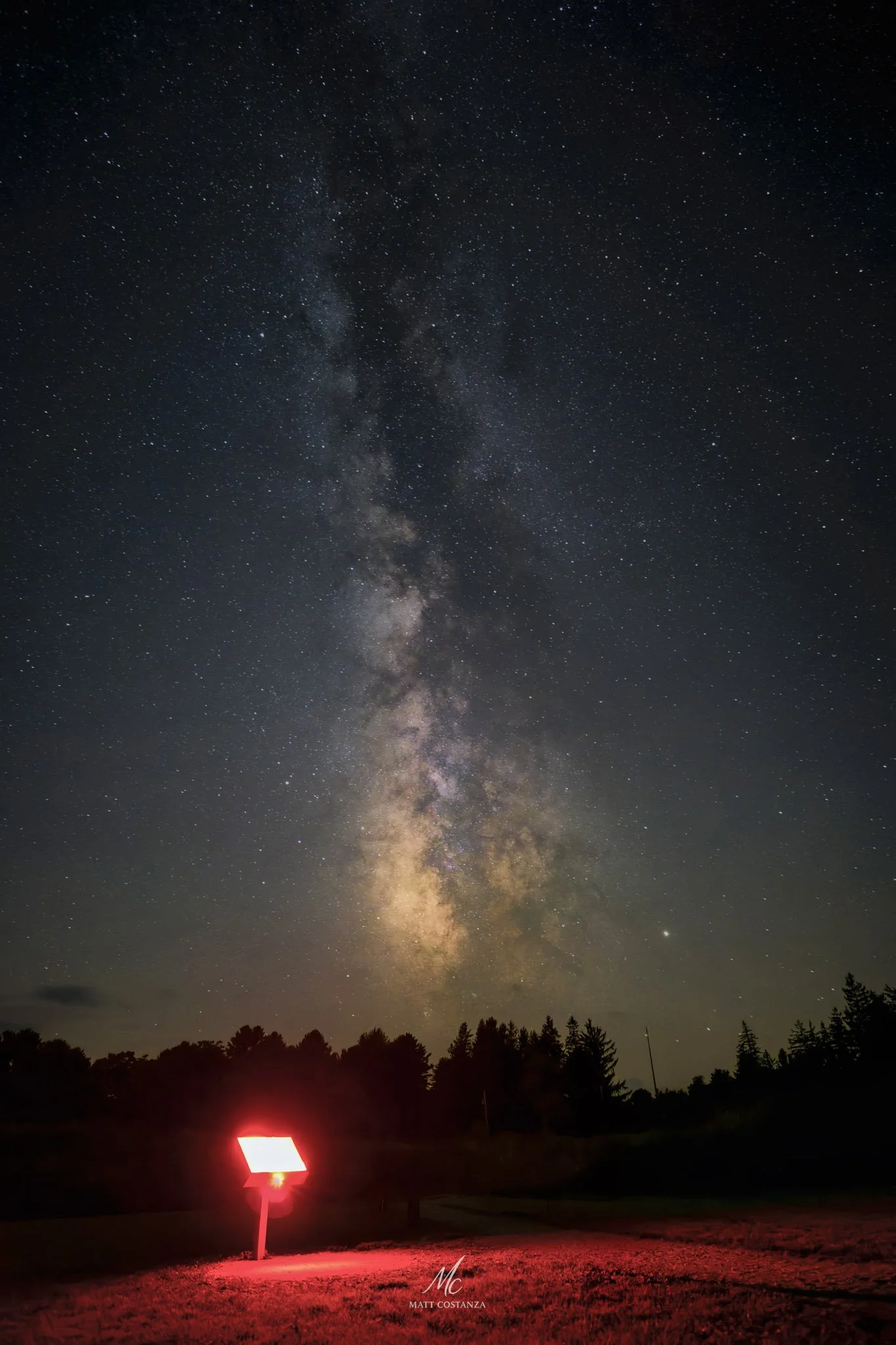 Milky Way above red-lit information kiosk, Cherry Springs State Park, Pennsylvania