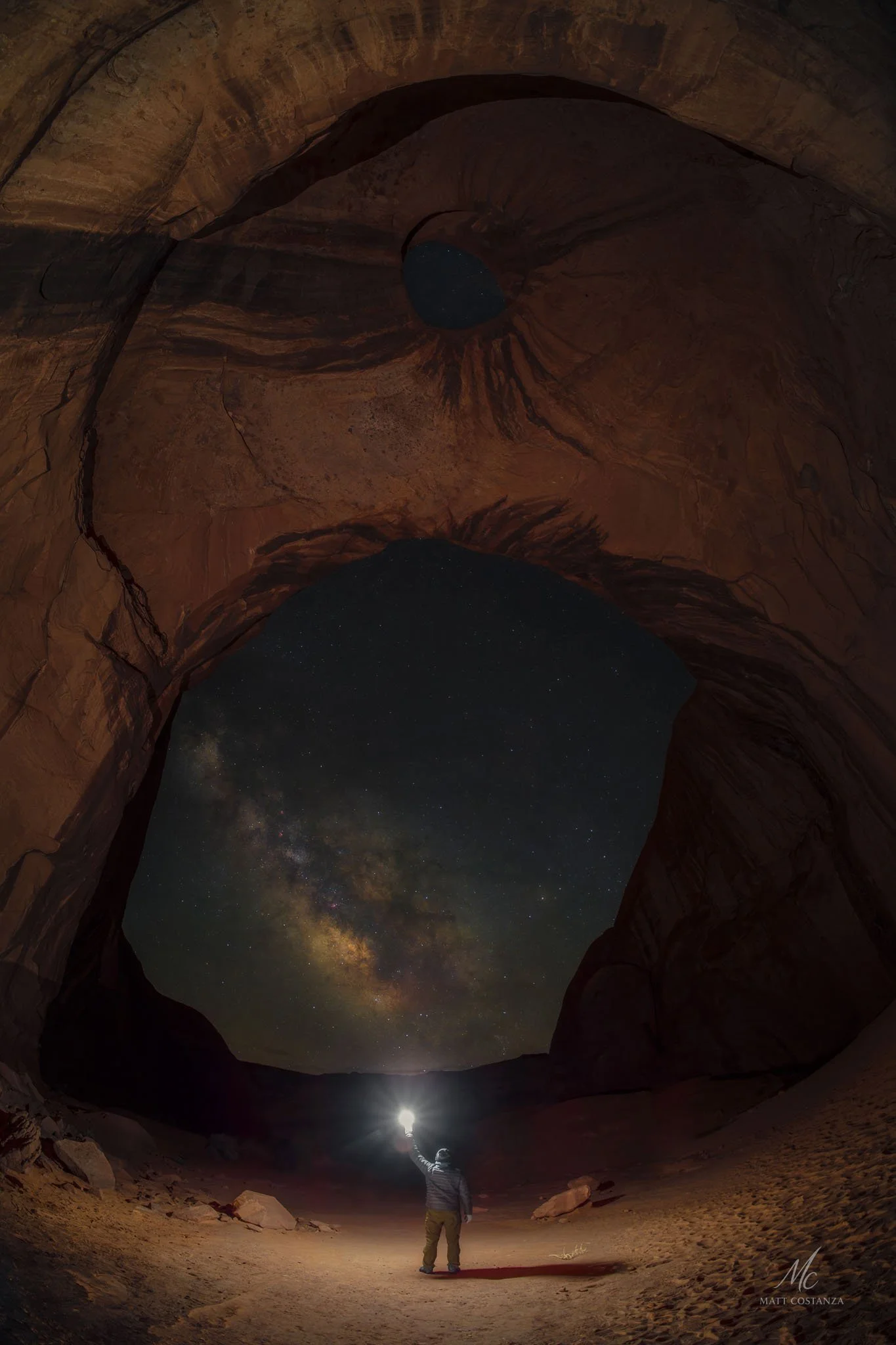 Milky Way rising through Big Hogan Arch, Monument Valley, Arizona