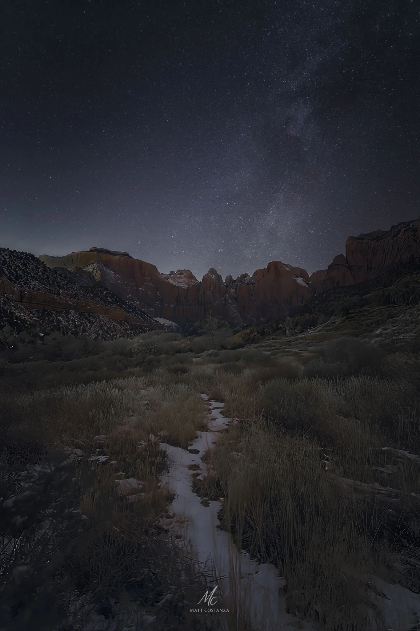 Towers of the Virgin, Zion National Park, under a winter night sky.
